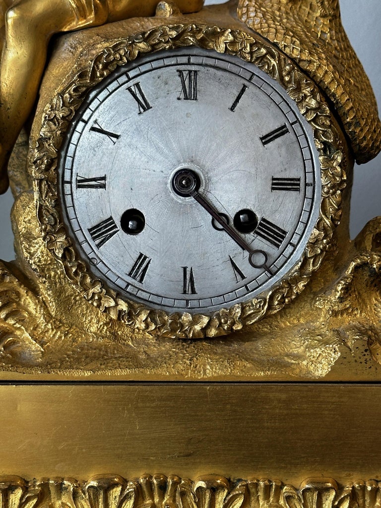 Empire Early 19th Century French Gilt Bronze Figural Clock For Sale