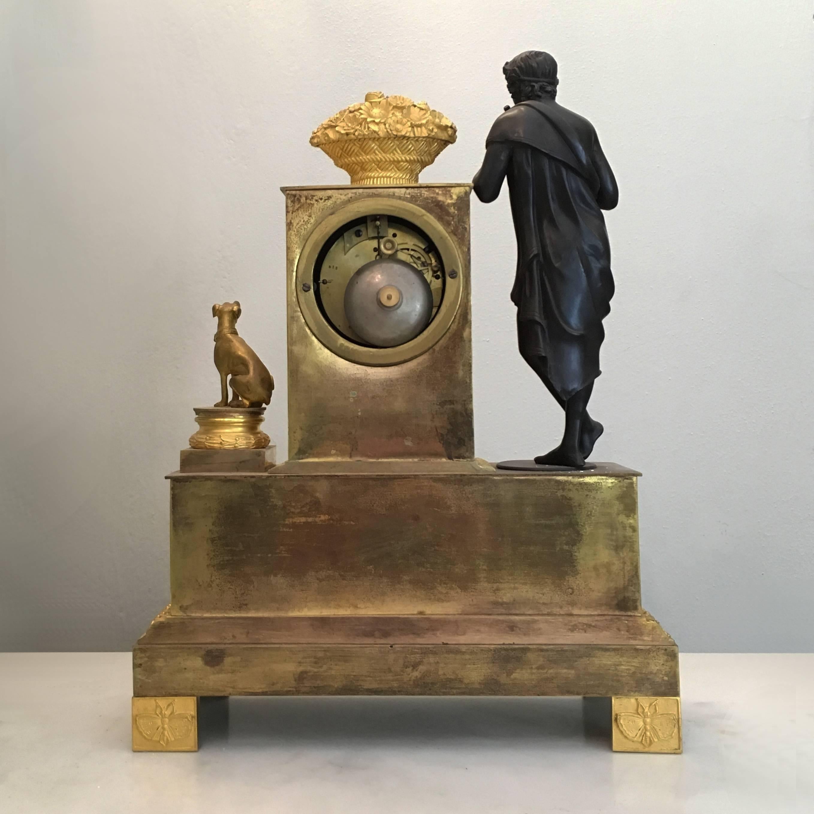 Early 19th Century French Gilt Bronze Pendulum Clock with Dionysus In Good Condition In Firenze, IT