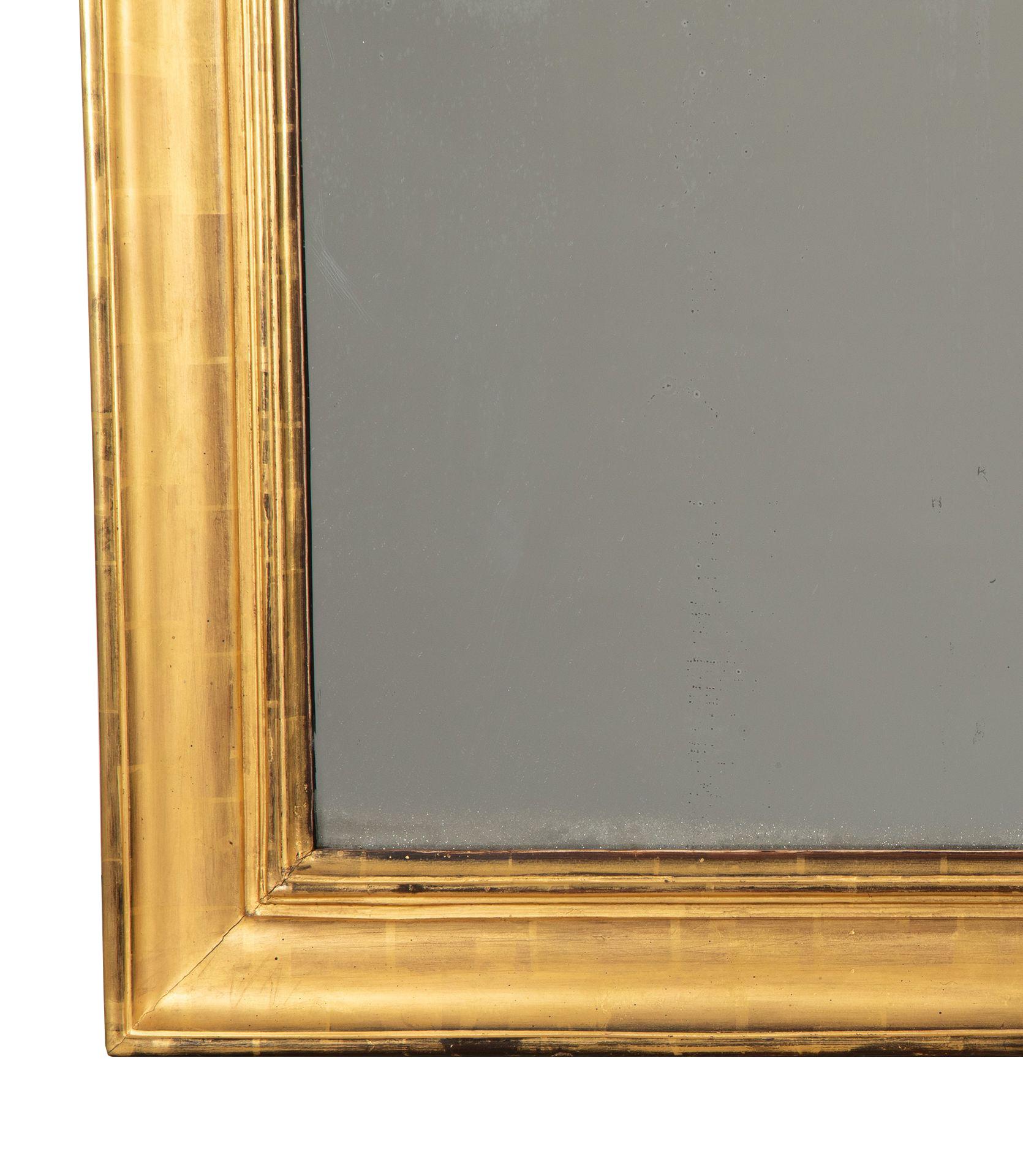 Espejo francés de madera dorada de principios del siglo XIX Francés en venta