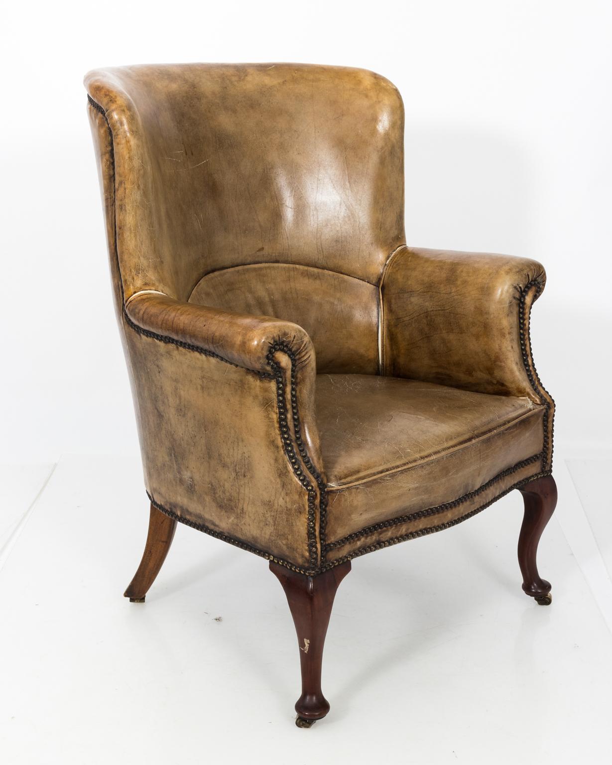 French Provincial Early 19th Century French Leather Wing Chair