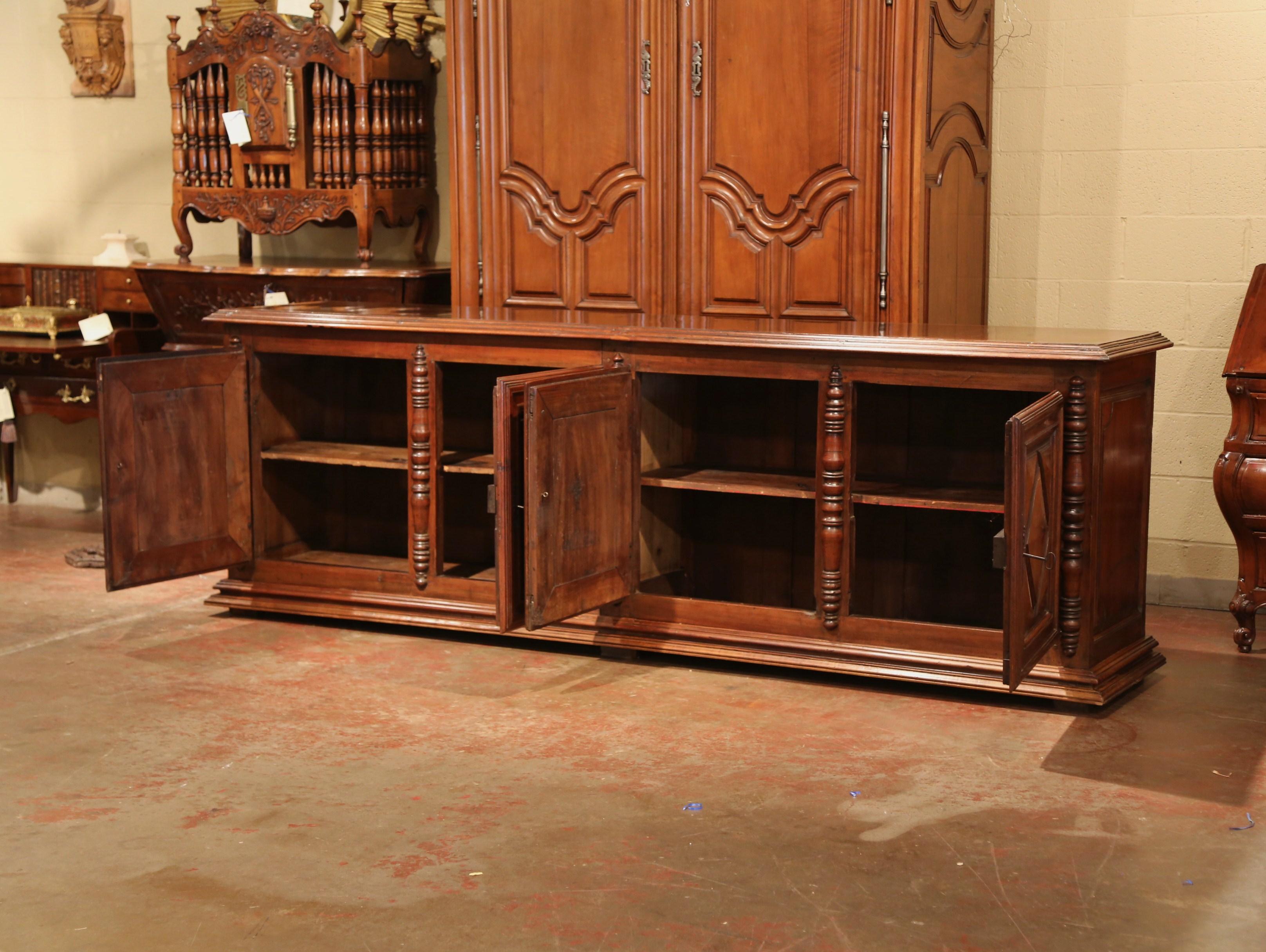 Early 19th Century French Louis XIII Carved Walnut Four-Door Enfilade Buffet In Excellent Condition In Dallas, TX
