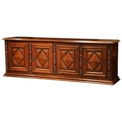 Antique Early 19th Century French Louis XIII Carved Walnut Four-Door Enfilade Buffet