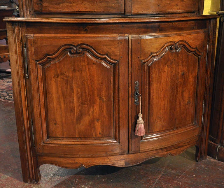 Patinated Early 19th Century French Louis XV Carved Walnut Two-Piece Bombe Corner Cabinet For Sale