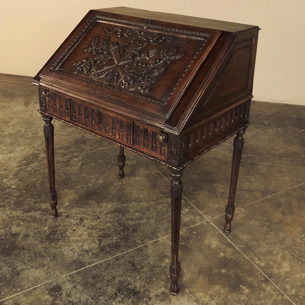 Early 19th century French Louis XVI secretary was fashioned from hand-selected indigenous oak to emulate the styles set forth by the most recent monarch. The Neoclassical Revival favored architecture and embellishments inspired by the ancient Greeks