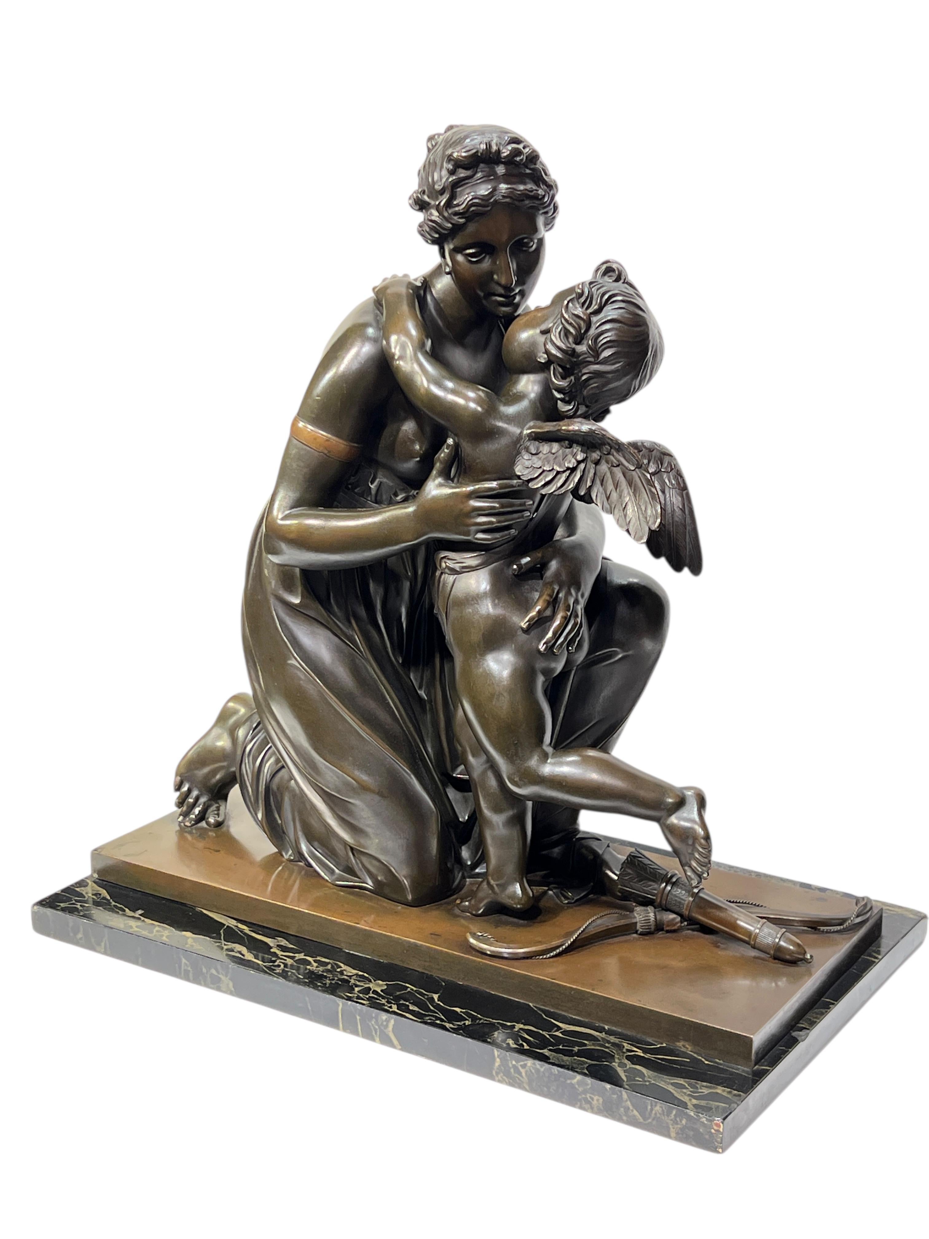 finest quality French Antique (19th century) patinated bronze sculpture of Venus and cupid, exquisitely modeled, cast and patinated to the finest quality.  Apparently unsigned.  Mounted on rectangular marble plinth.  20 by 20 by 8 inches.  76 lbs.