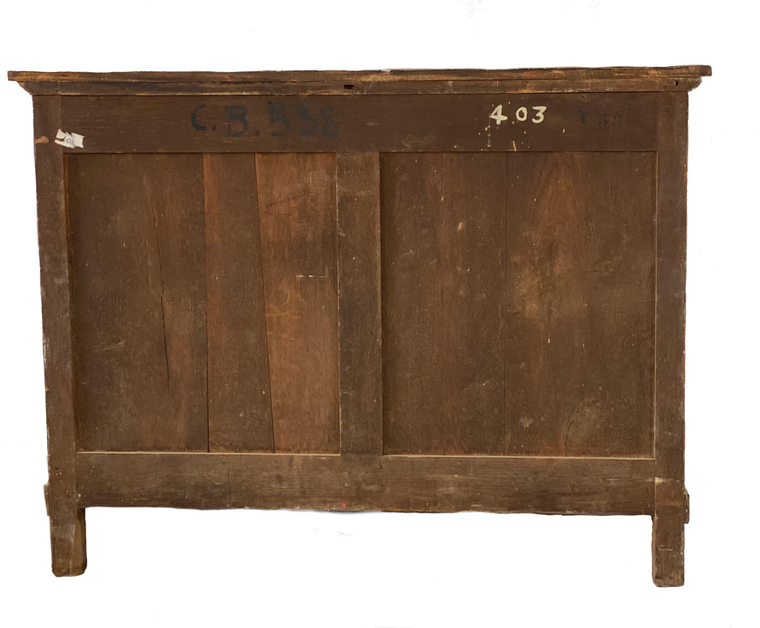 French neoclassical chest dating from the first half of the 19th century painted in green. The chest has three drawers and is decorated with family coat of arm and various other motifs.