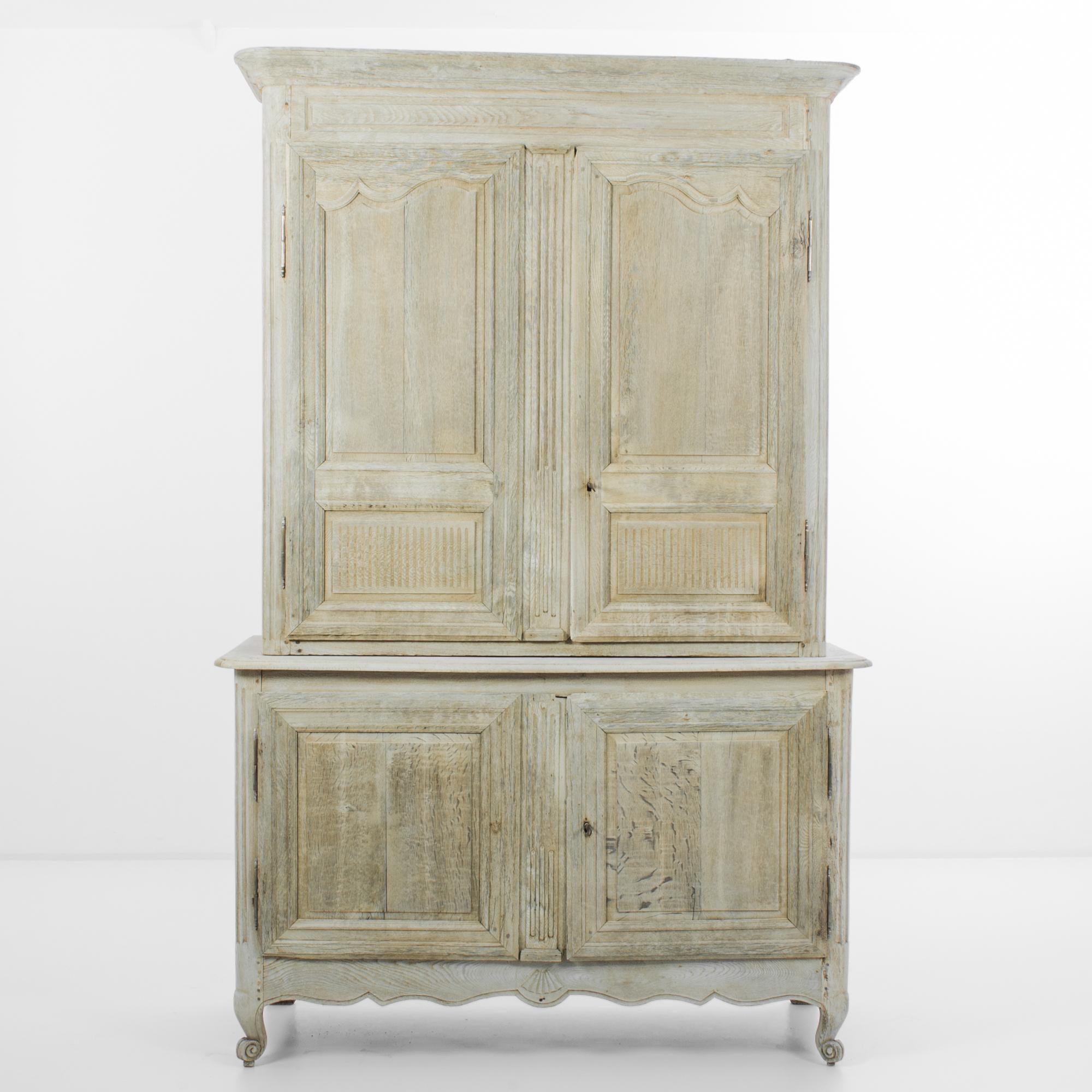 The quintessential French Provincial buffet cabinet, made circa 1800. The simple geometric shape recalls a countryside local and the time tested approach of regional French cabinet makers. Distinctive period design is highlighted by the unique