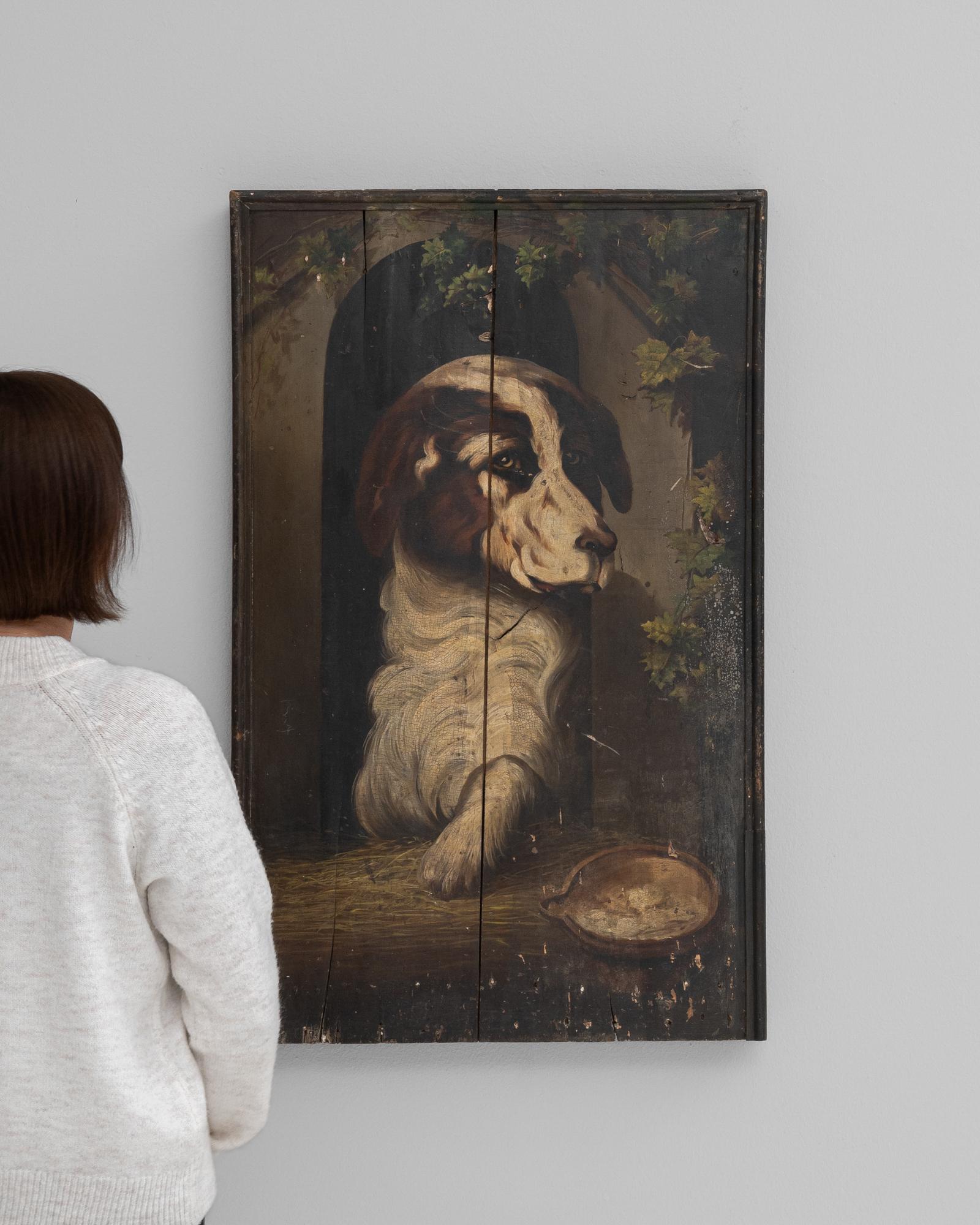This Early 19th Century French Oil Painting captures the endearing essence of a faithful companion with its lifelike portrayal of a dog. The use of oil on canvas allows for rich, deep coloration and fine texture that bring the subject to life,