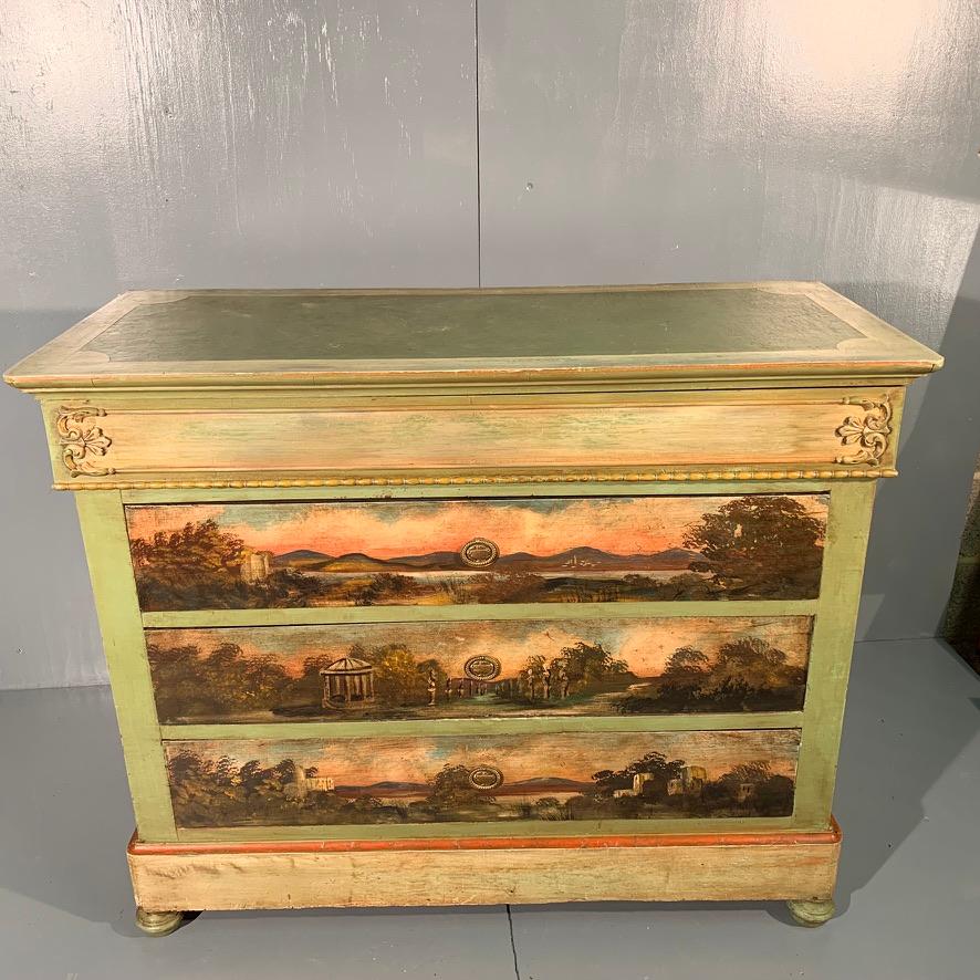 Good decorative French 19th century painted commode chest of drawers.
Lovely color tones to this piece and the four full width drawers also giving good storage space too.
Three different hand painted scenes to the drawers and the top frieze drawer