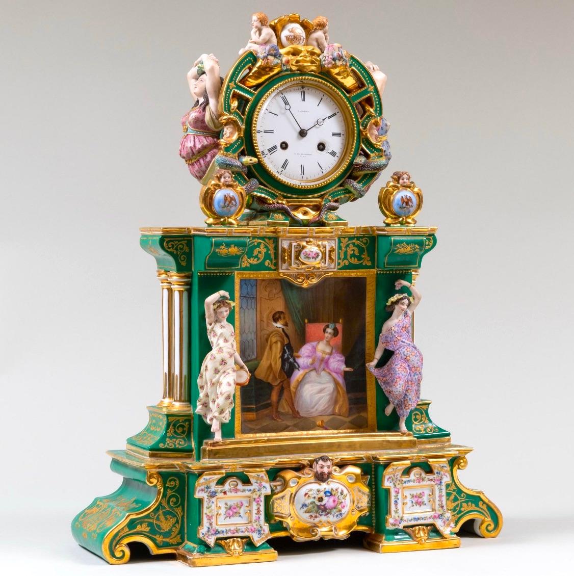 This exquisite early 19th-century Paris porcelain figural clock on a stand is a stunning example of French craftsmanship. The clock features a vibrant green ground, hand-gilt accents, and intricately painted decorative scenes, showcasing