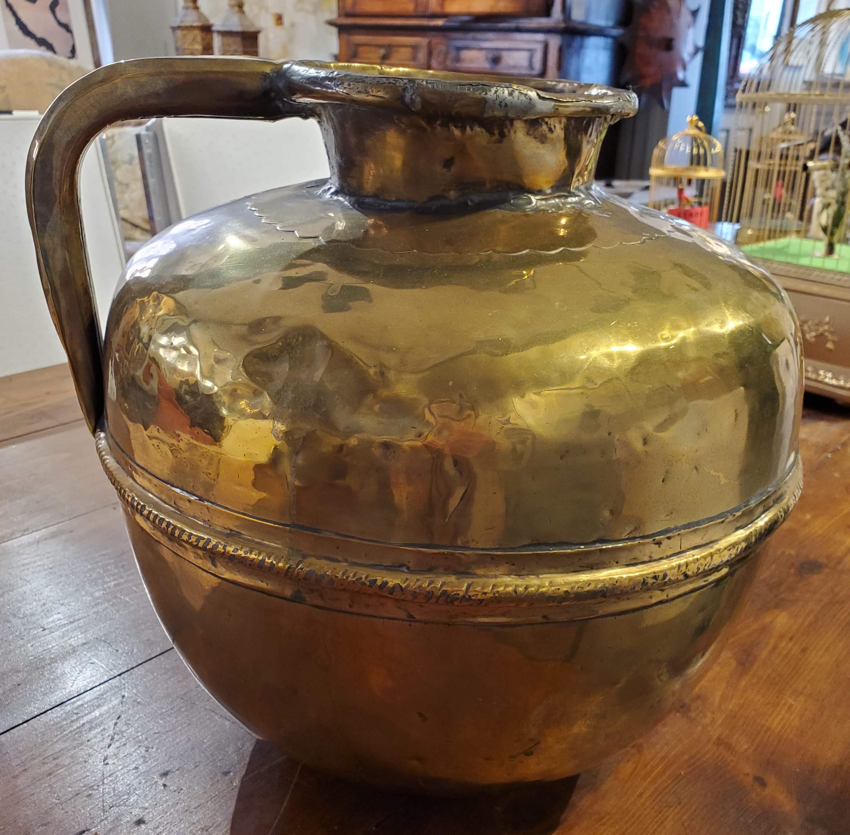 Early 19th century French Provincial brass pitcher. Good proportions with decorative details. French pitcher that could fit into your Greco-Roman decor.
Provence, circa 1830.
Measures: 13.5” H, 15” Dm.
