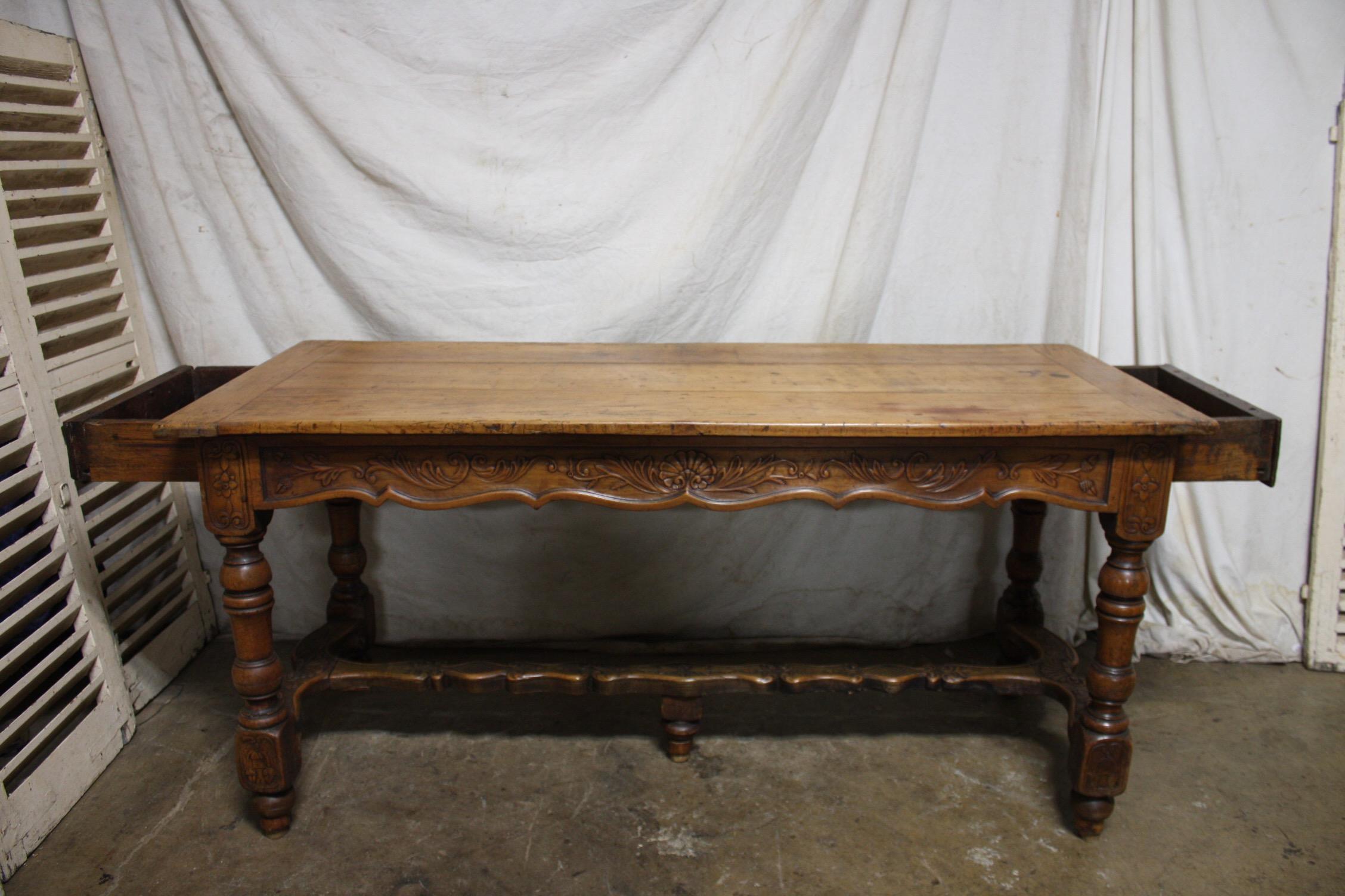 The wood wears a beautiful 18th century patine with all the history on the top. This table has a lot of character, thick drawers on each side and a 5th feet at the center, very different.