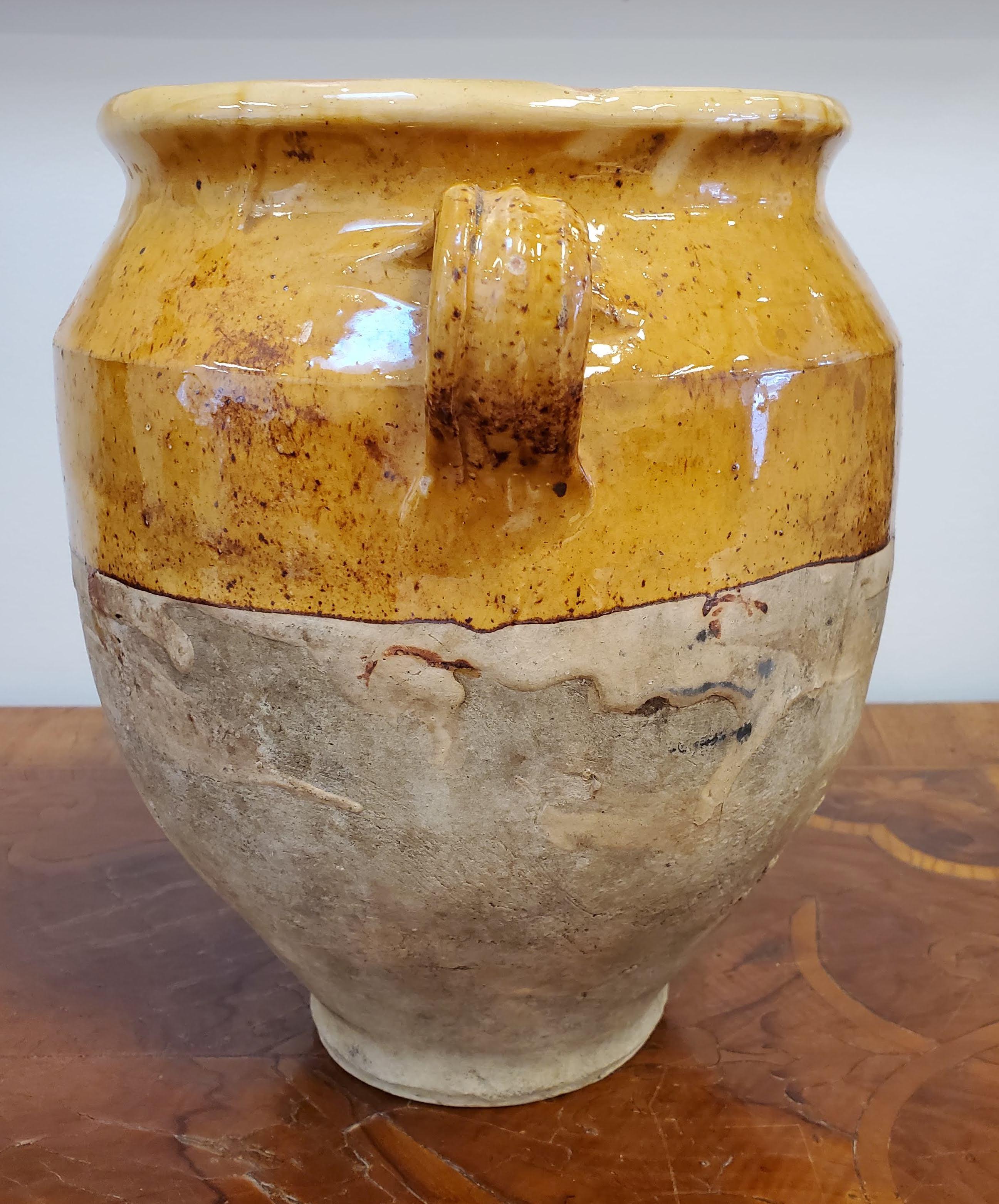 French Provincial terra cotta “Confit” Pot. Yellow glazed. Once a staple in French kitchens, confit pots were popular to preserve and cook duck before refrigeration existed. They are also the featured vase in Van Gogh's Sunflower series.
Southern