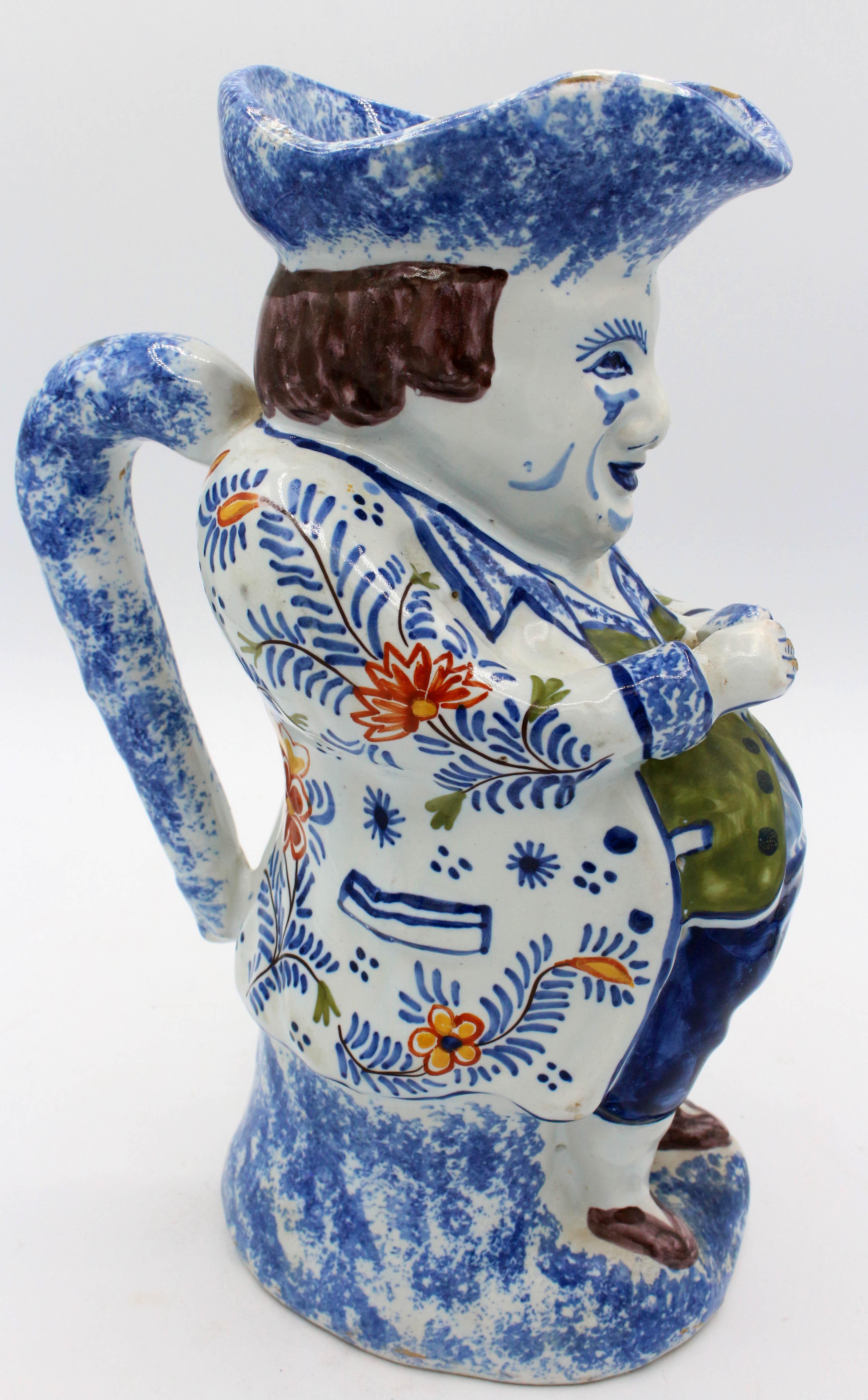 Early 19th century Toby jug, faience, French. Marked in blue underglaze 