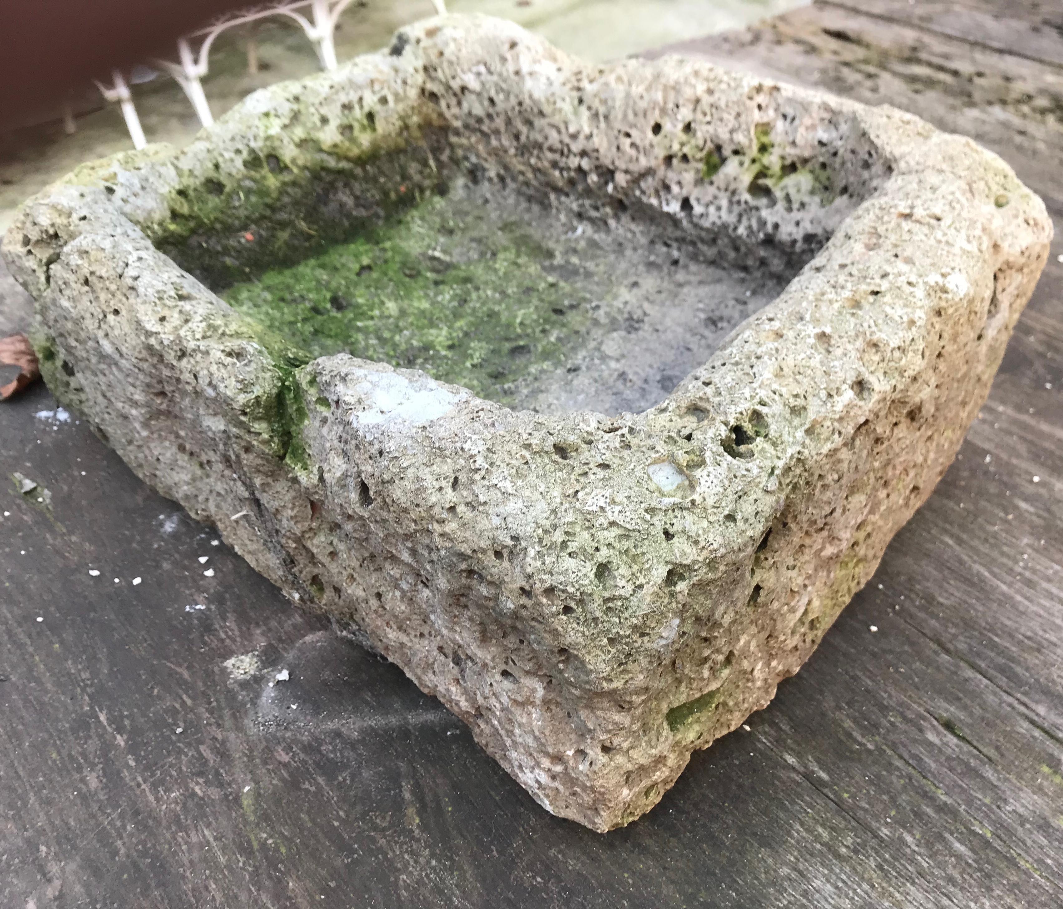 A hand carved trough from a single piece of volcanic rock from the Auvergne region of France (land of ancient dormant volcanos) wonderfully irregular and with great patina from years of outdoor use as a fountain basin.
Could be drilled for a drain