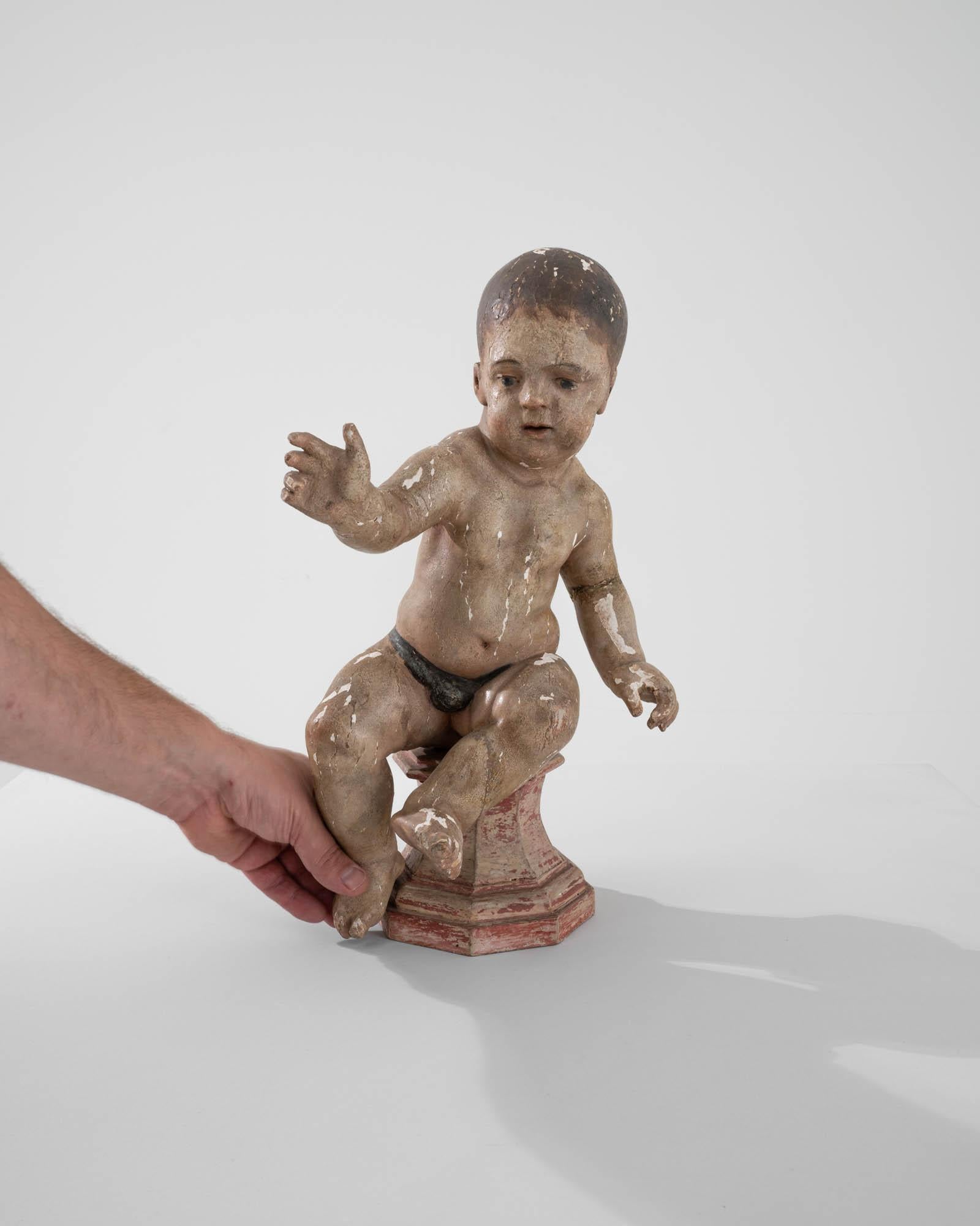 French Provincial Early 19th Century French Wooden Sculpture of a Young Child For Sale