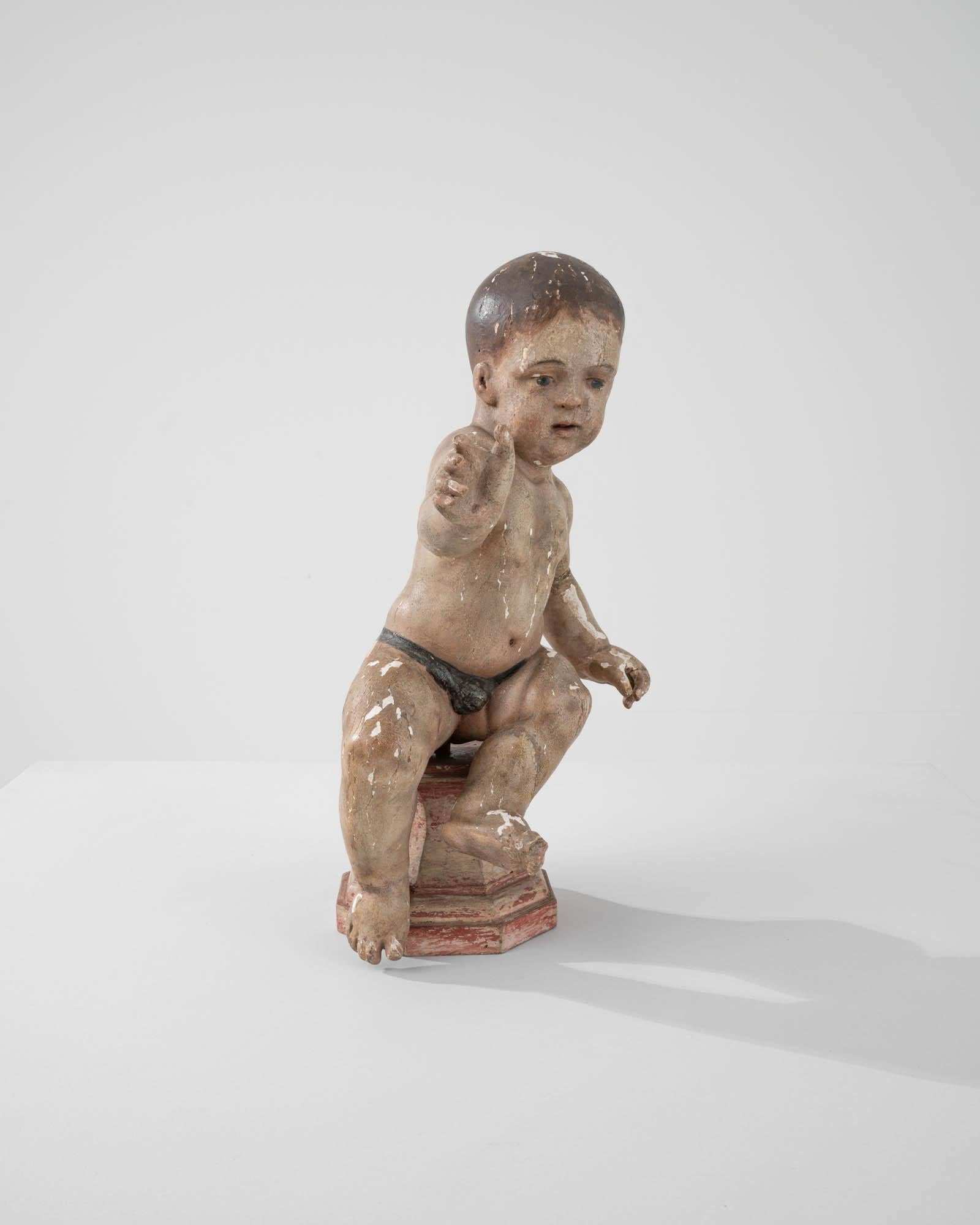 Early 19th Century French Wooden Sculpture of a Young Child In Good Condition For Sale In High Point, NC