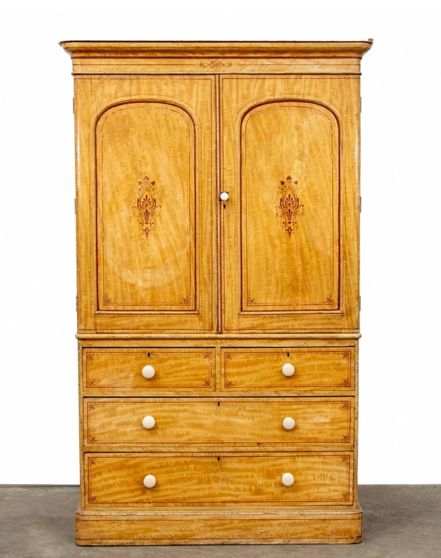 A most impressive large scale refined English country house faux painted pine satin birch linen press armoire (or housekeeper’s cupboard) by Gainsford & Company, London, England. 

Hand-crafted in London in the early 19th / possibly late 18th