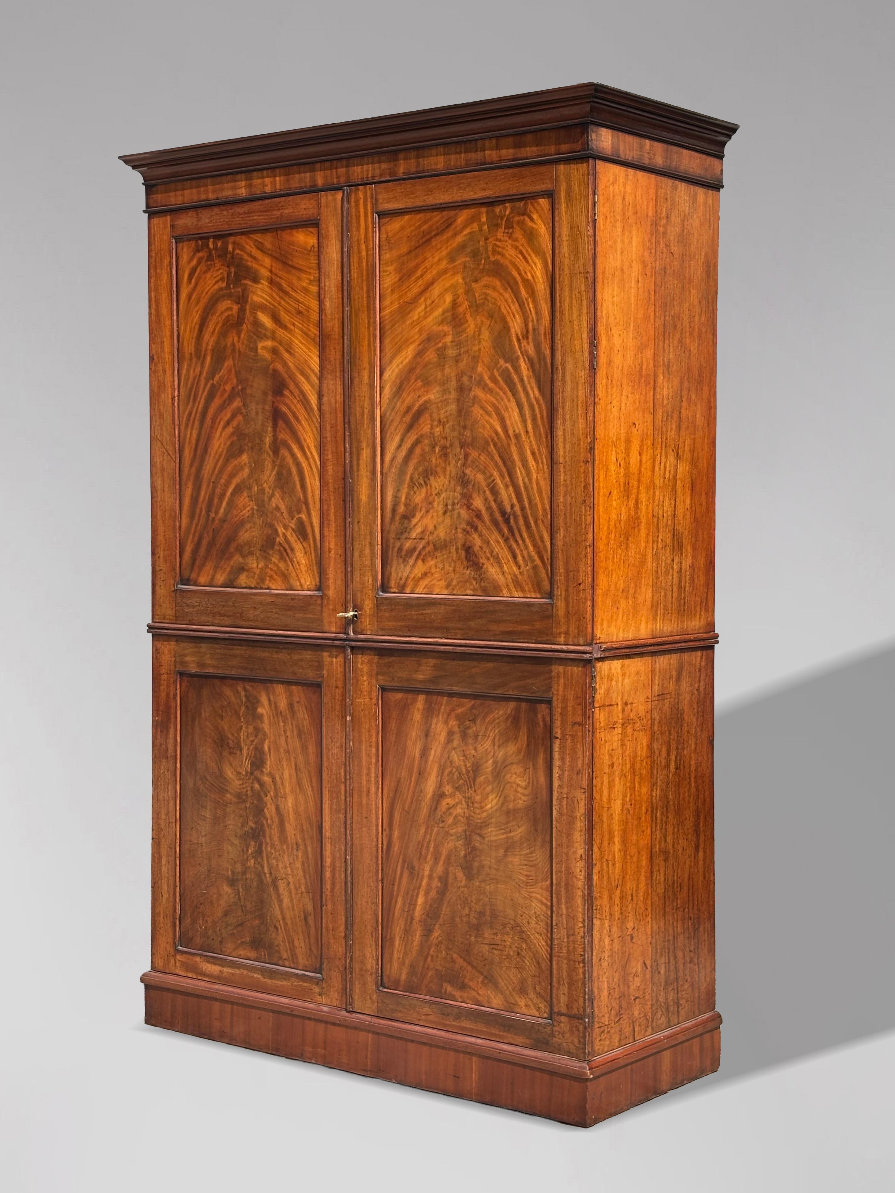 Quality Early 19th Century George IV Period Mahogany 2-Door Wardrobe

This superb late Georgian gentleman’s wardrobe, crafted circa 1825, is a true statement piece that beautifully combines elegance, utility, and period craftsmanship. Made from