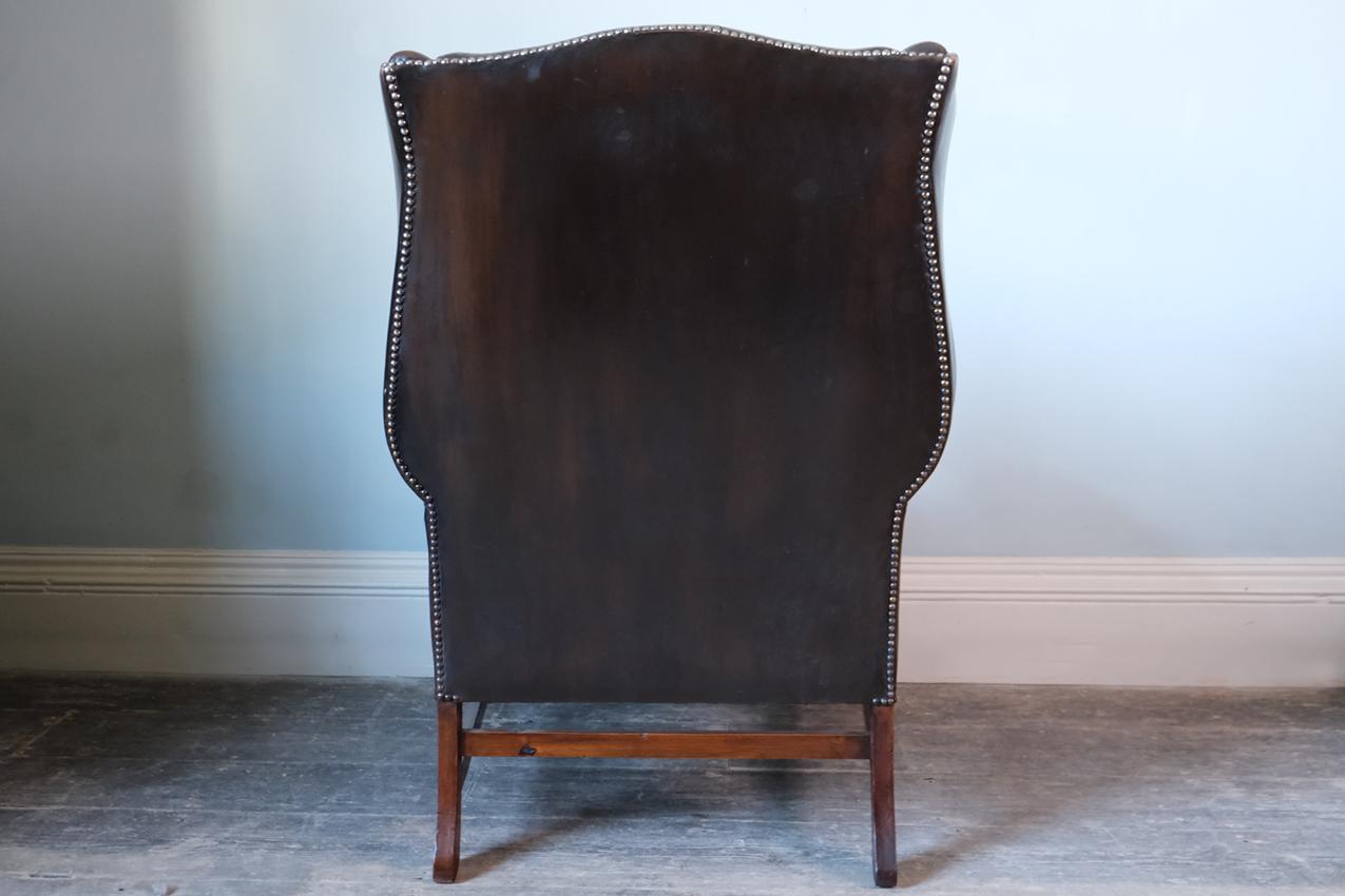 Metal Early 19th Century Georgian Brown Leather-Upholstered Wingback Armchair For Sale