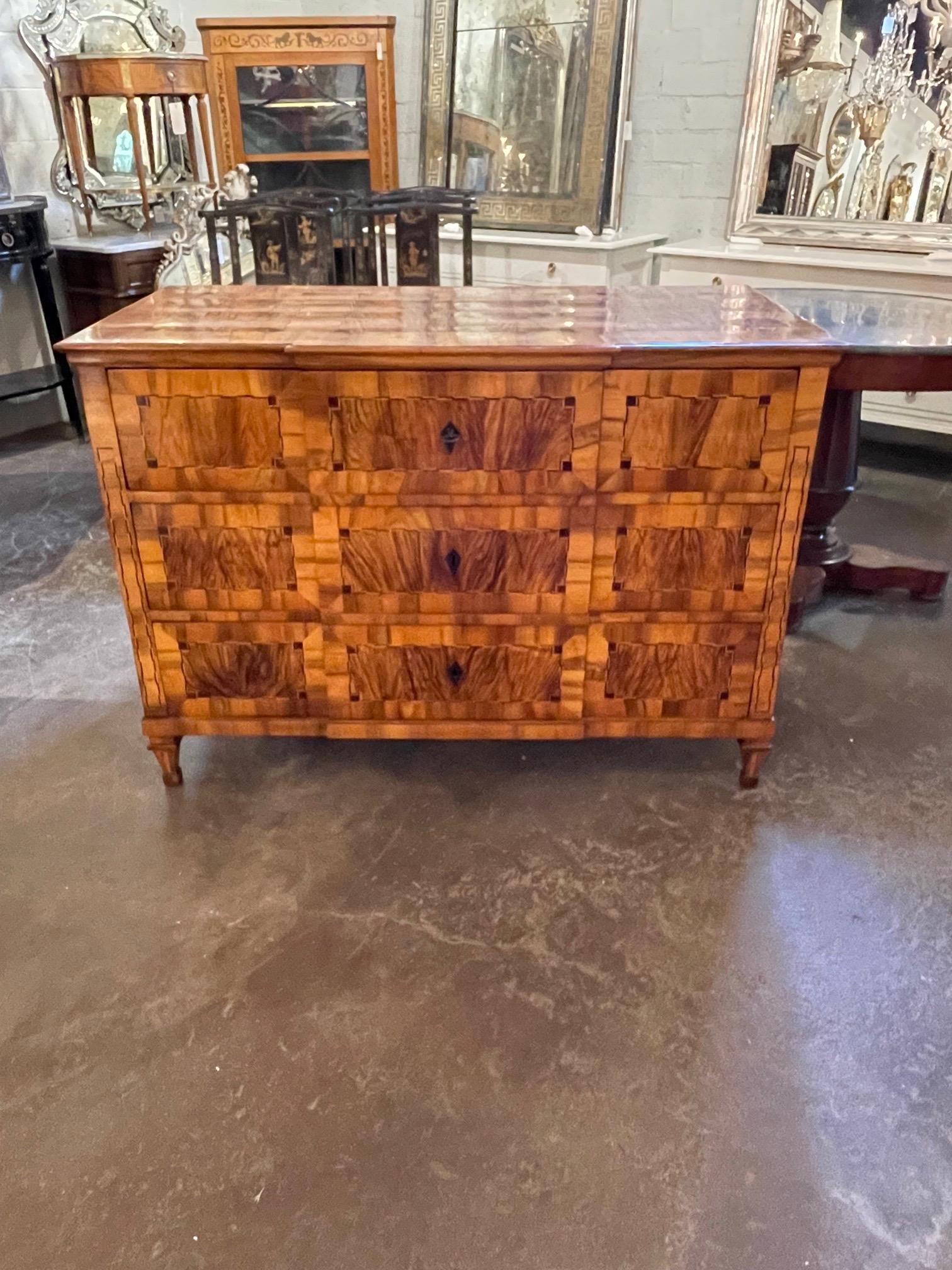 Gorgeous early 19th century German Biedermeier walnut commode with black walnut inlay. Beautiful polished wood with interesting pattern. An exceptional piece!
