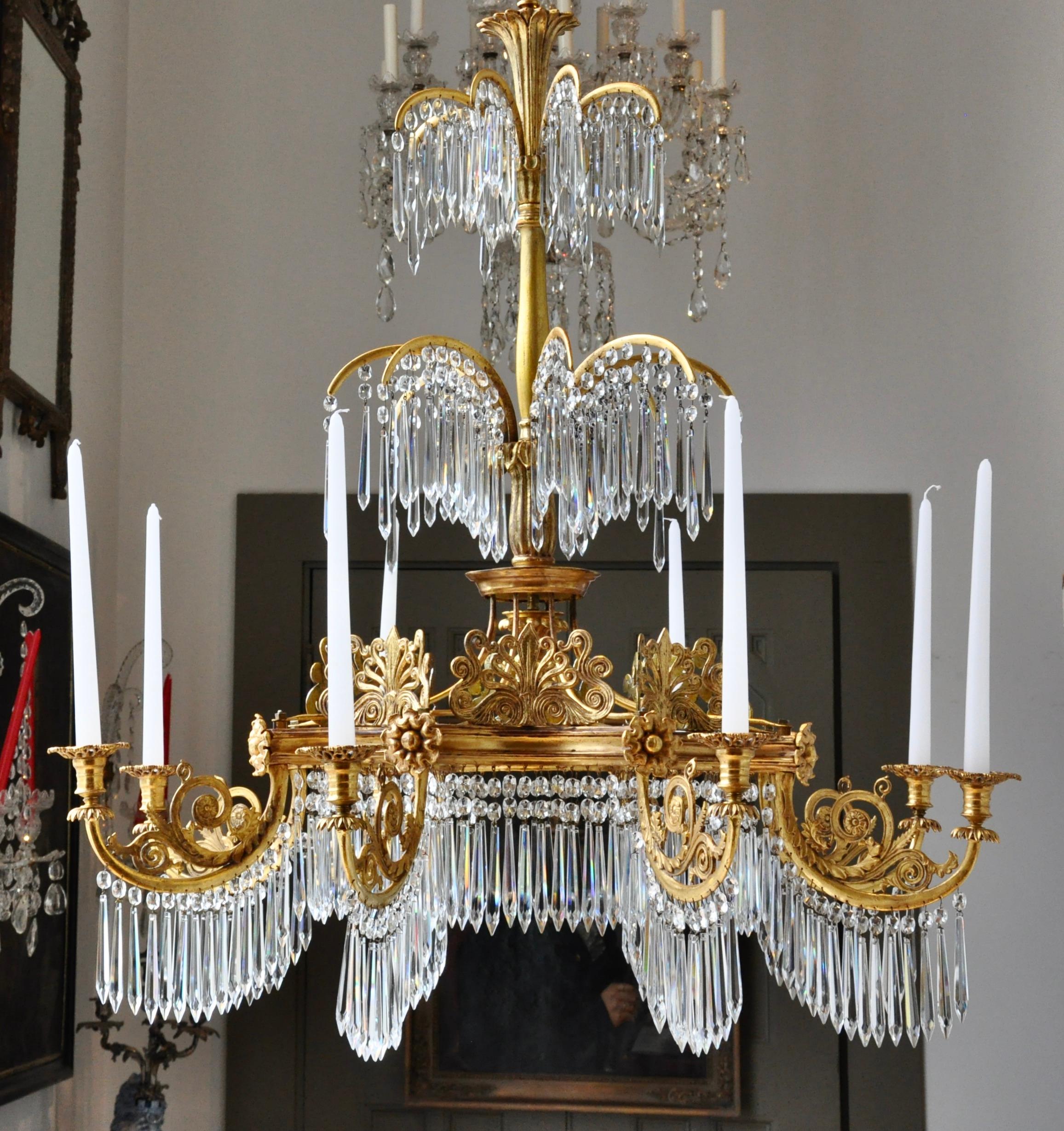 A fine and rare German giltwood, gilt-lead and cut-glass eight-light chandelier
circa 1820 after a design by Karl F. Schinkel. Berlin.


Note
Karl Friedrich Schinkel (1781-1841) was the principal architect to the Prussian court and supplied a