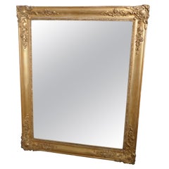 Miroir mural doré du début du XIXe siècle