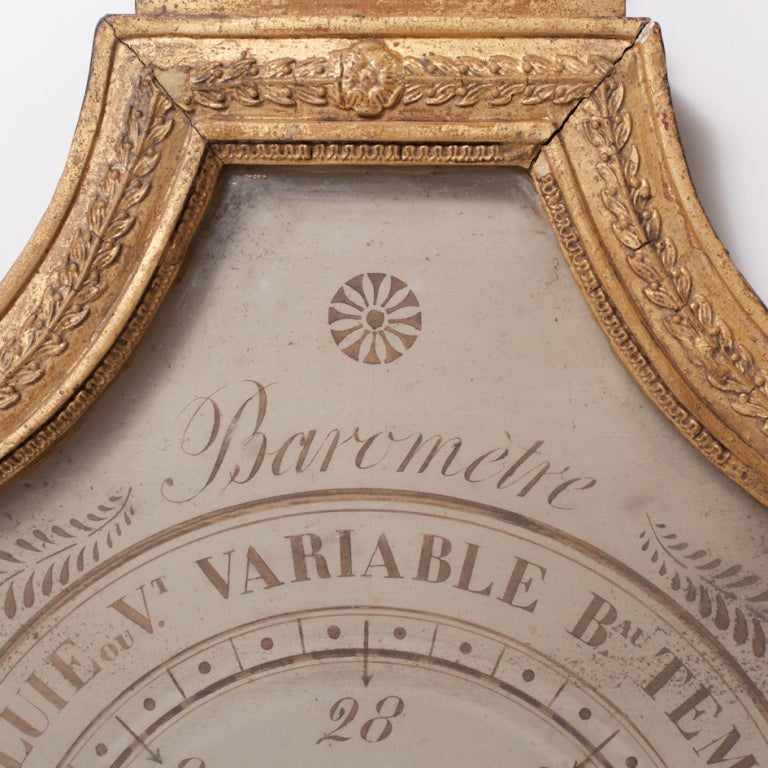 Baromètre en bois doré du début du 19e siècle 