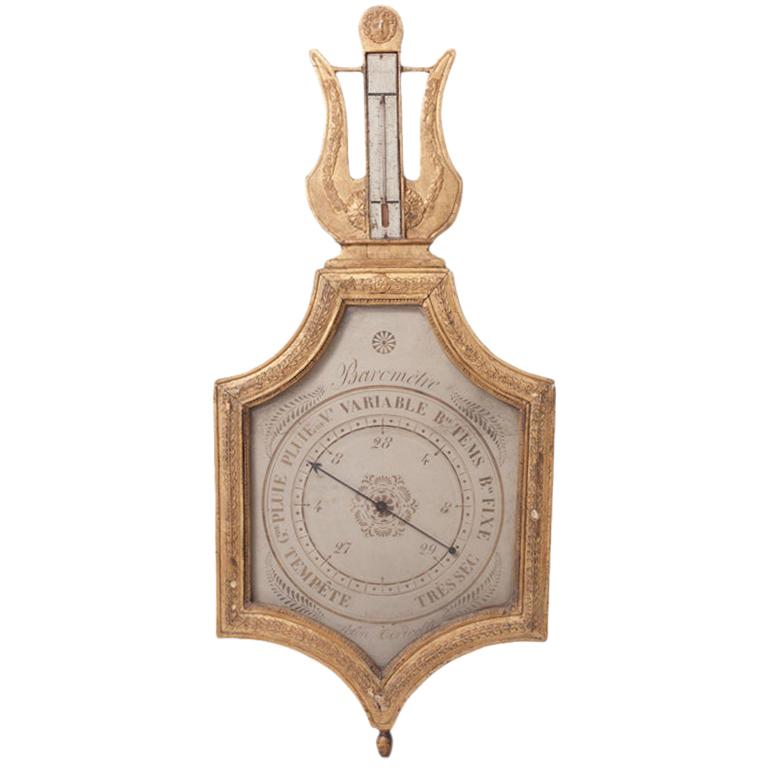 Barometer aus vergoldetem Holz des frühen 19. Jahrhunderts „Selon Toricelli“