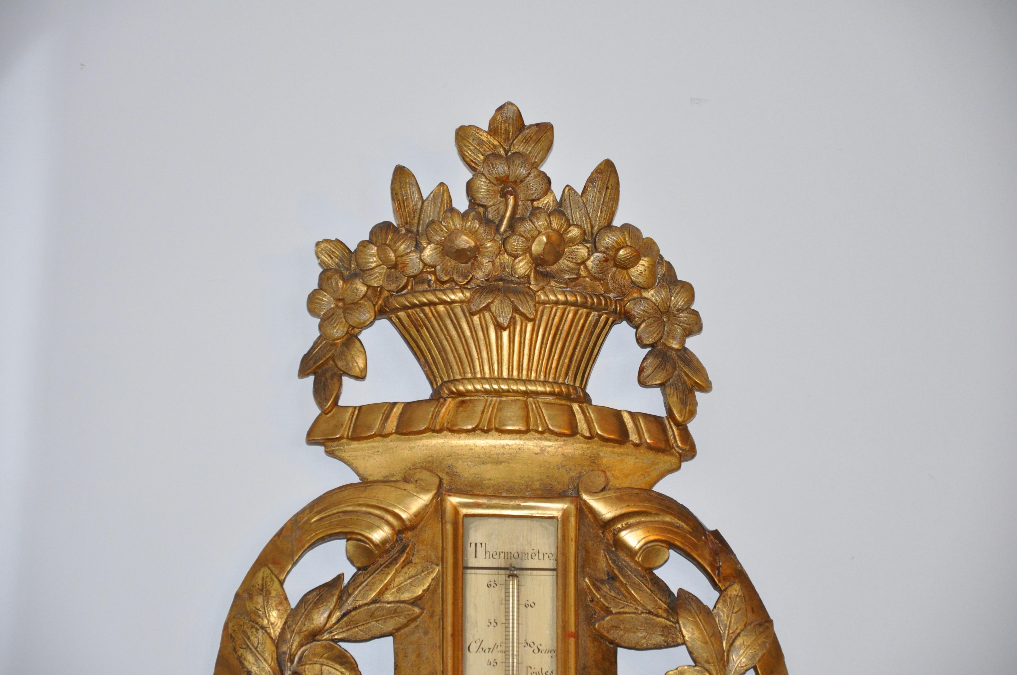 Early 19th century large scale giltwood barometer. Neoclassical Louis XVI design of all carved and original gilt foliate elements. Quite substantial.