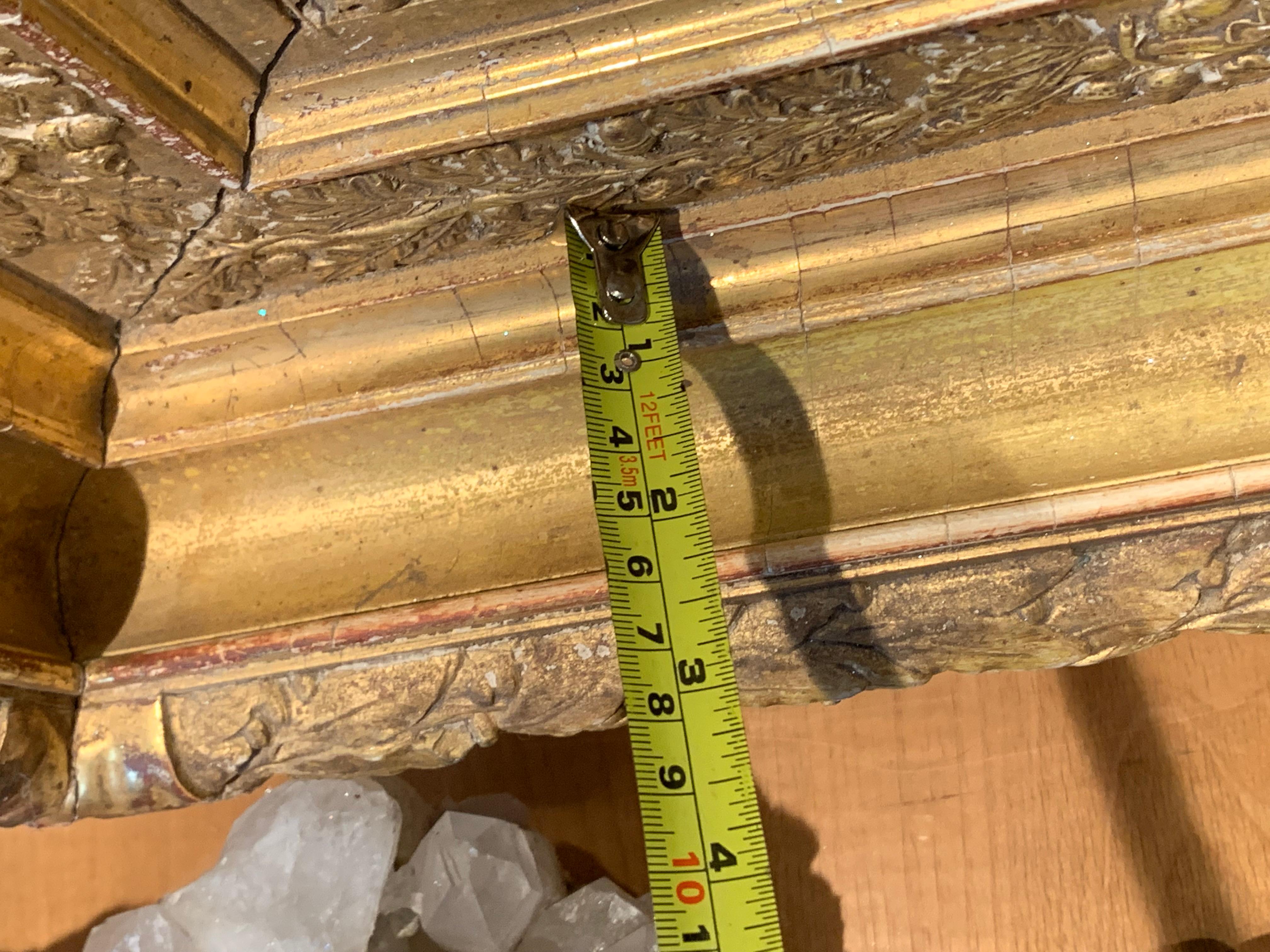 Bois Miroir en bois doré du début du XIXe siècle en vente