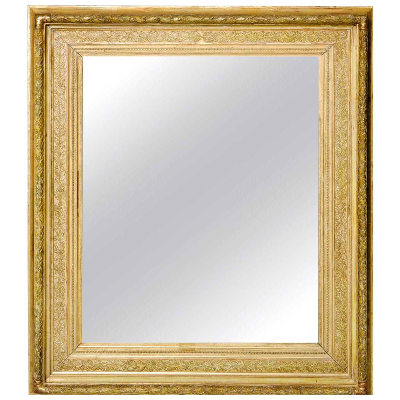 Miroir en bois doré du début du XIXe siècle