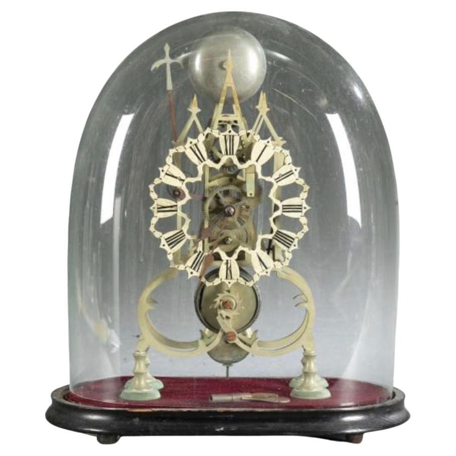 Early 19th Century, Gothic Brass Skeleton Clock on Wood Base with Glass Dome For Sale