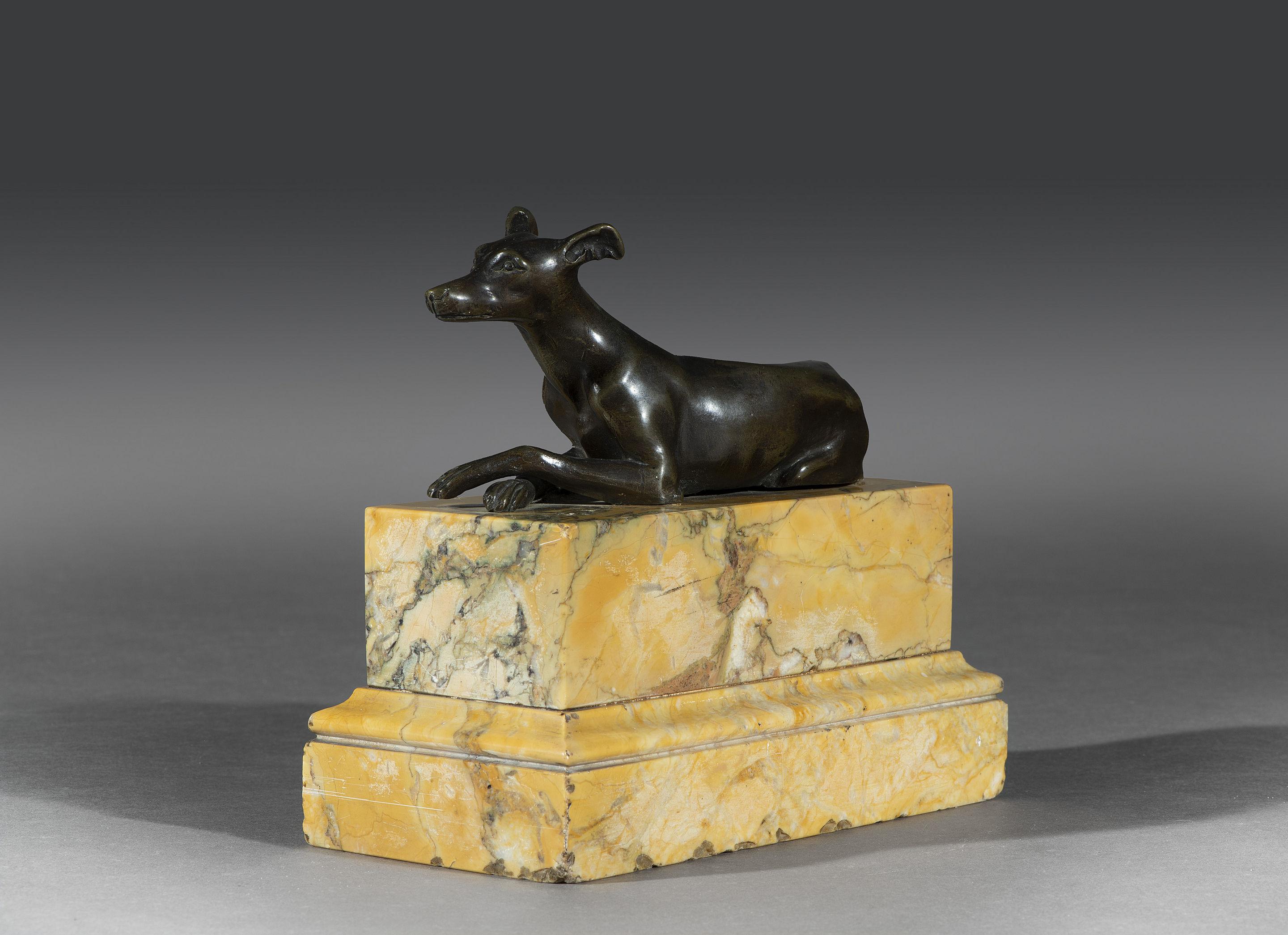 Early 19th century grand tour bronze figure on a sienna marble plinth.