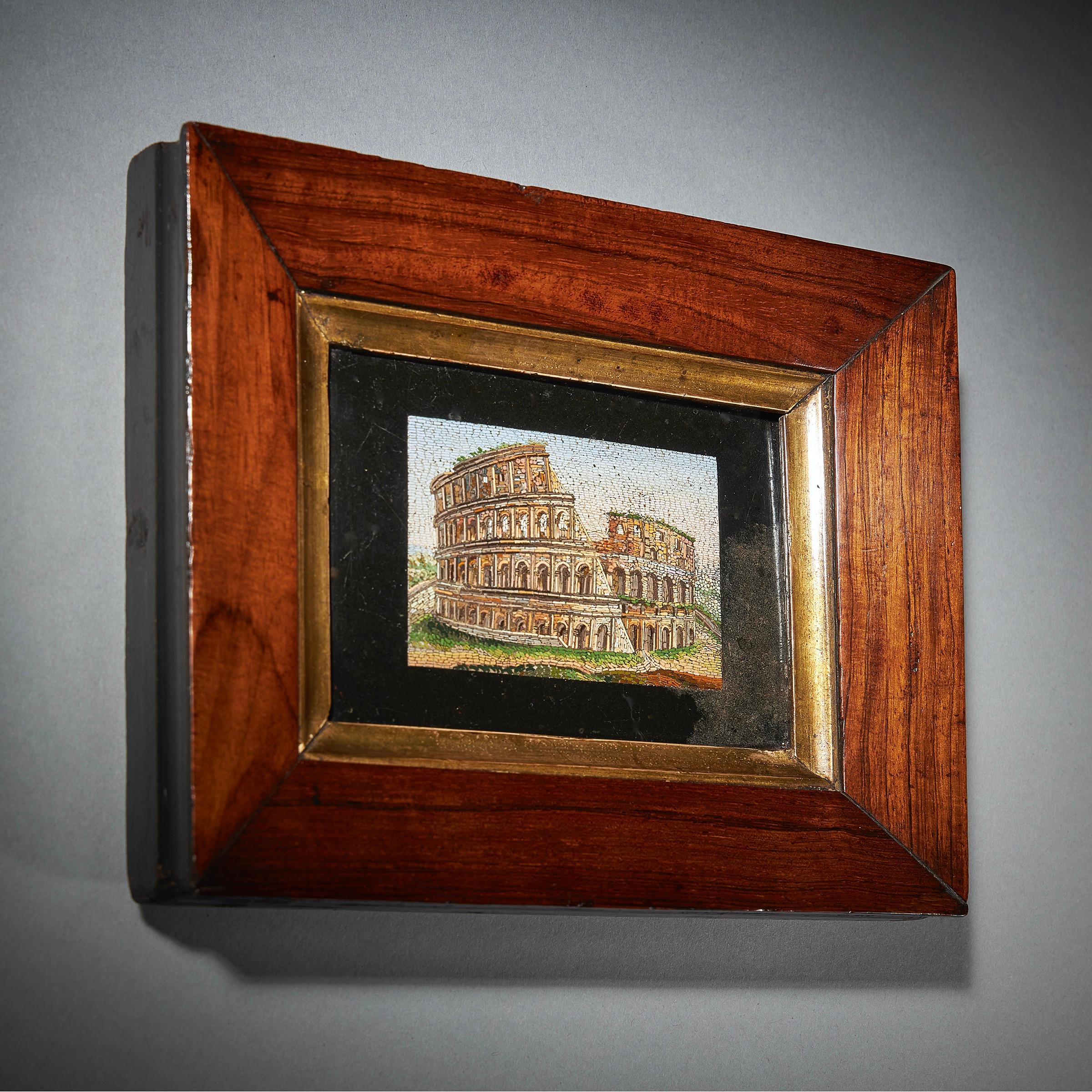 A fine and rare early 19th century framed grand tour pulvinated micro mosaic of the iconic Colosseum of Rome, Italy, in a period frame.

This is a most unusual micro mosaic as it is pulvinated, giving a three-dimensional view of the architectural