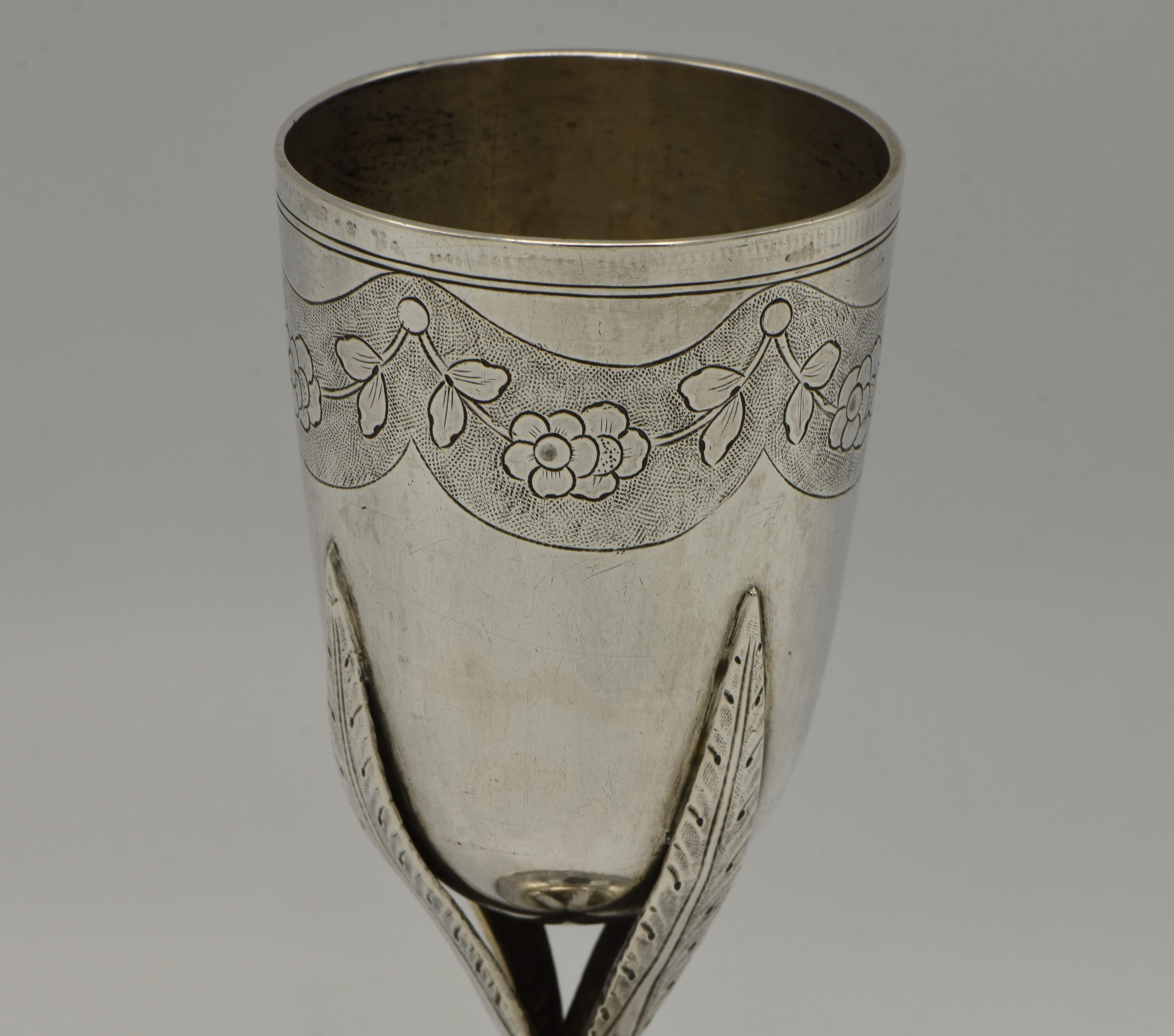 Handmade silver Kiddush goblet, Lemberg, Habsburg Empire, 1814
On square flowers-decorated base with three leaves shaped stem and engraved on the wine section with leaves and flowers.
Marked on the bottom with Lemberg silver hallmarks for