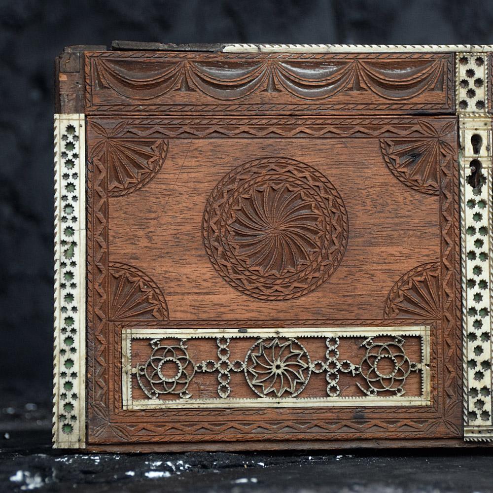 Early 19th Century Hand Carved Prisoner of War Box 
A purist example of a 19th Century hand carved prisoner of war (POW) token box. Detailed in wonderful hand carved motifs including burning hearts, geometric shapes, and inlaid mutton bone designs.