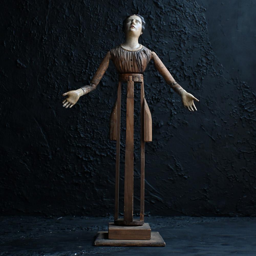 Early 19th century Hand Carved Santos Figure

A detailed hand-crafted early 19th Century articulated female Santo’s figure in original and untouched condition. This item has been re-painted over the years due to wear and tear however its structure