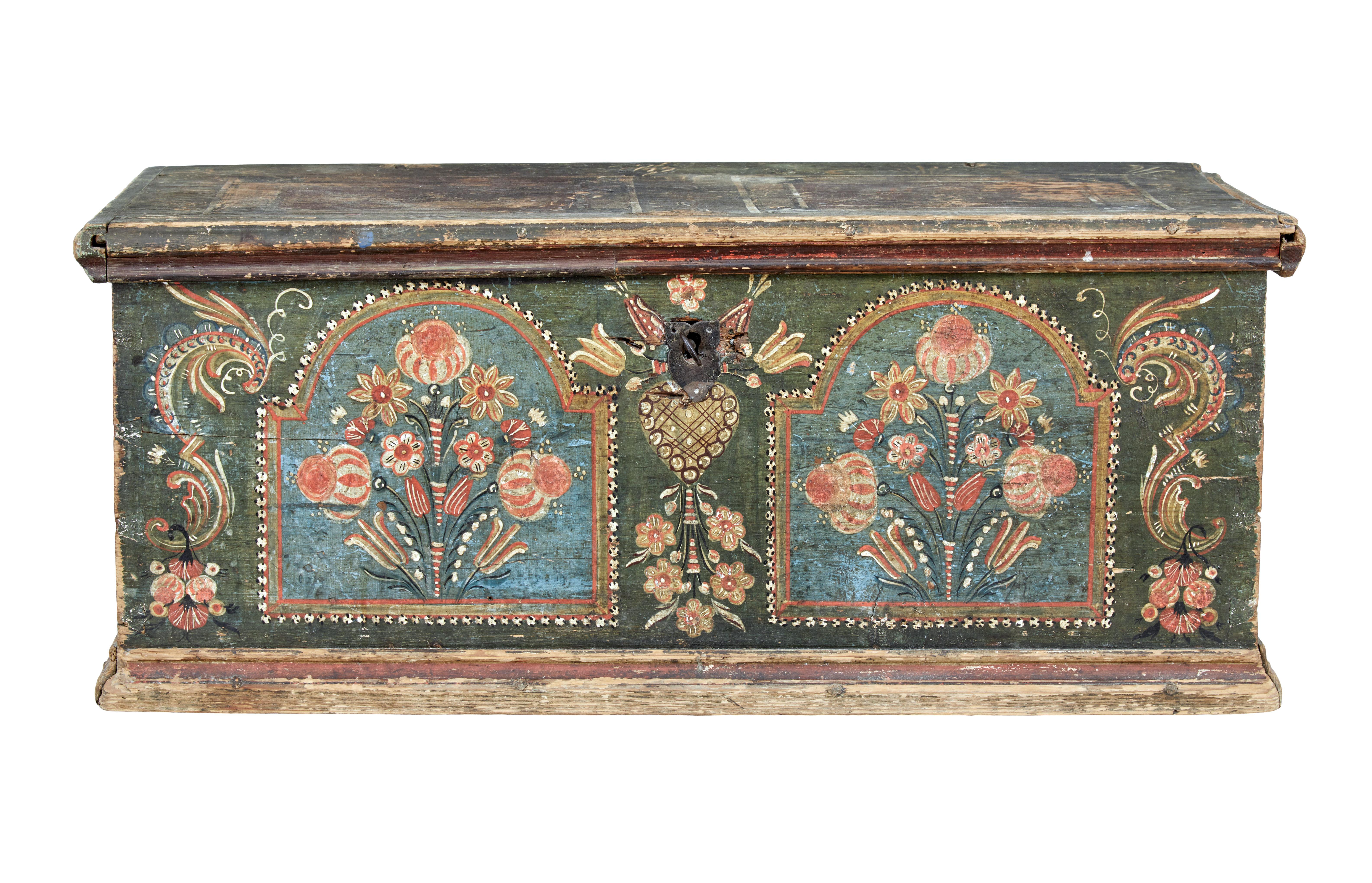 Early 19th century hand painted Swedish Folk Art pine box circa 1828.

We have dealt with a few of these boxes over the years, but this is one of the finest. Lovingly hand painted in greens and oranges depicting floral decoration. Signed in the