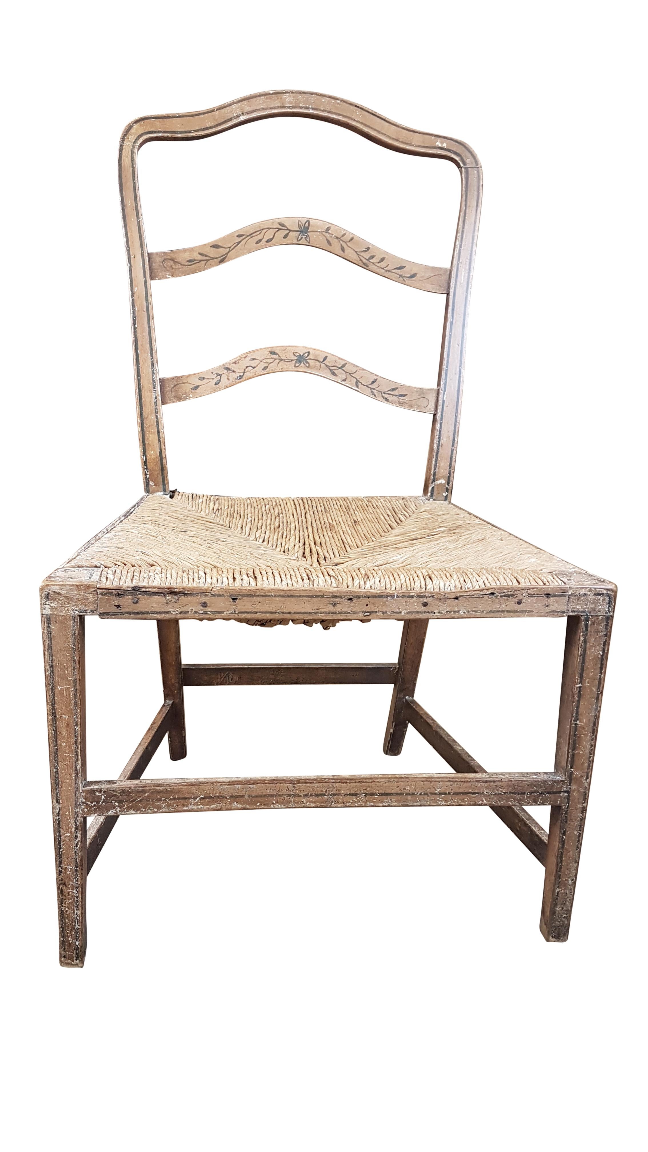 A very nice and rare early 19th century Georgian rush seated chair in original painted finish. The rush seat is in great condition and is the original seat, the painted finish whilst being scratched marked and worn is the original and the line and
