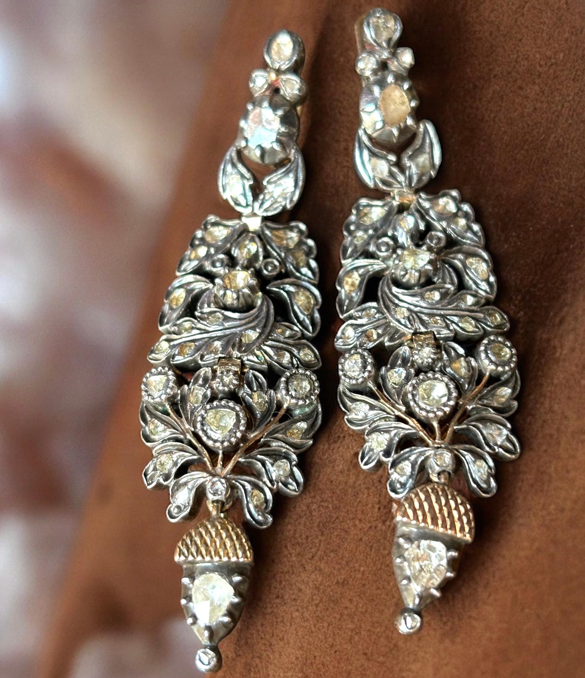 Antique Iberian (Catalan) Rose Cut Diamond Herring/ Chandelier Earrings. Ca. 1830
Wonderful large  early 19th Century diamond earrings. In silver & gold  with rose cut diamonds. Each composed of three linked sections in closed-back settings.  The