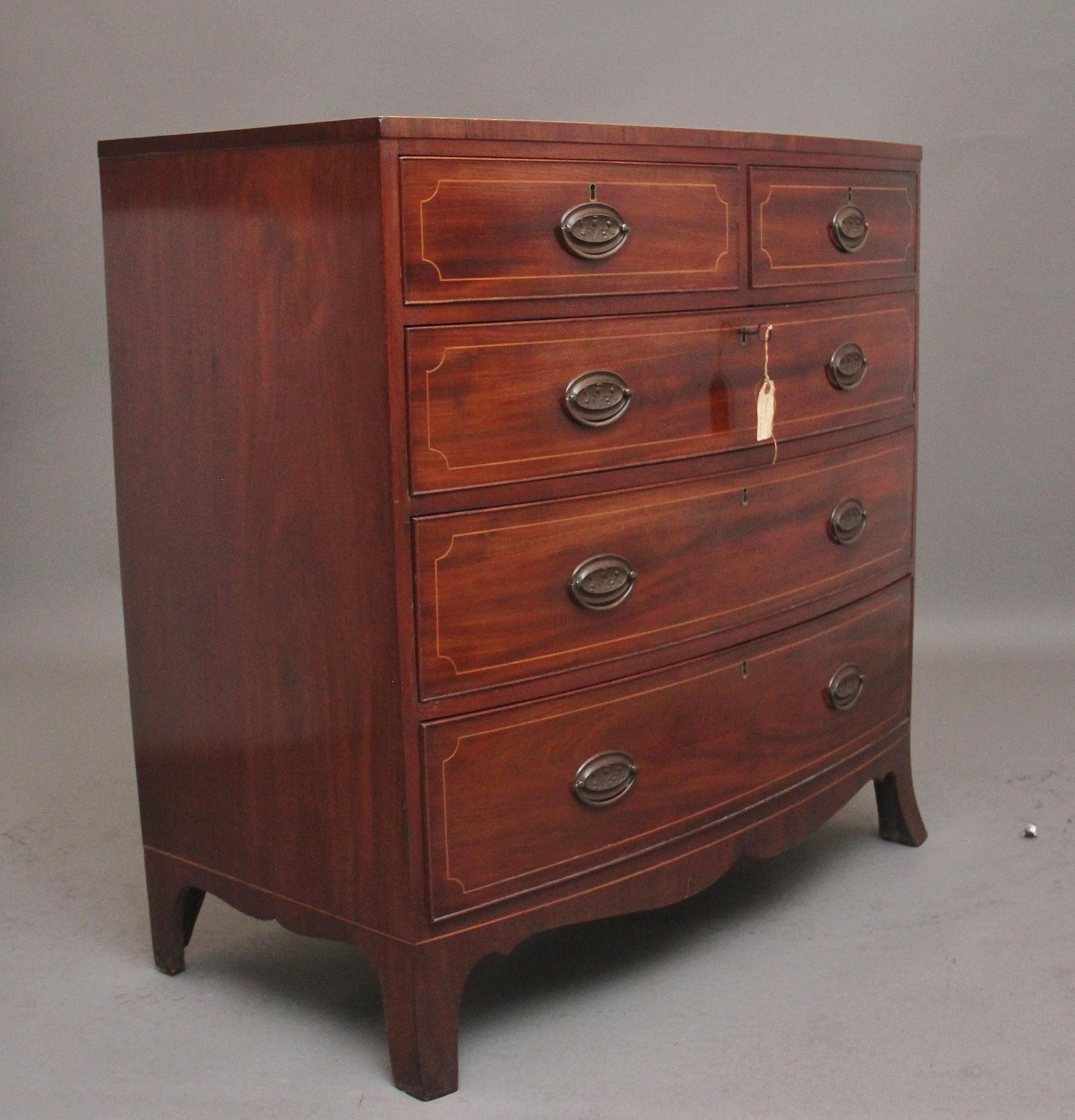 British Early 19th Century inlaid mahogany bowfront chest of drawers For Sale