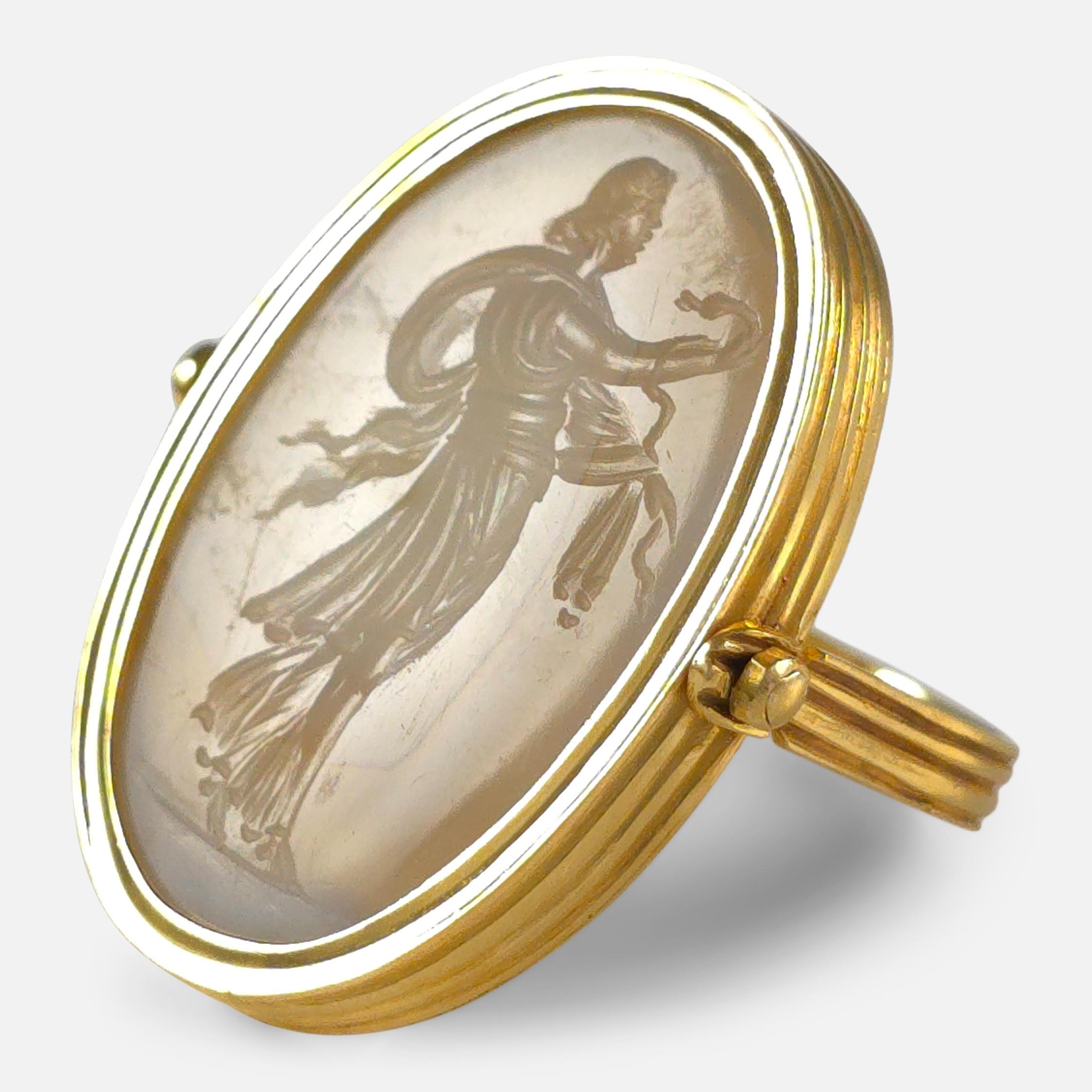 Early 19th century neoclassical intaglio ring set in 18ct gold, featuring a pale oval agate engraved with Hygieia, the goddess of health, holding a snake, set in a swivel mount with a fluted half-hoop.

• Period: Early 19th Century
• Date: Circa