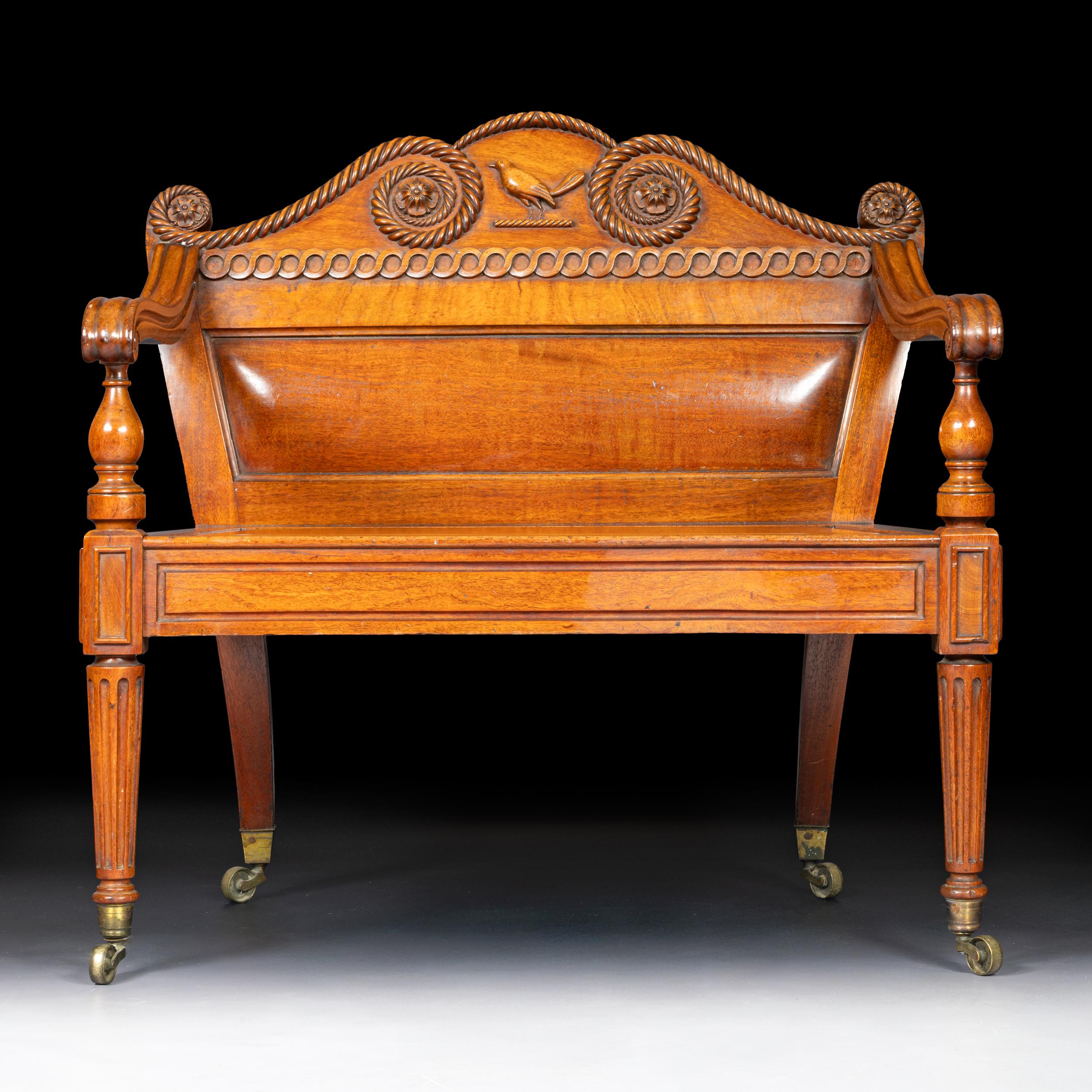 Un magnifique banc de hall en acajou du début du 19e siècle par Mack, Williams et Gibton, Dublin. Avec l'écusson de la famille Rochfort.

Circa 1810

Irlandais

Note de bas de page :

L'entreprise Mack, Williams et Gibton s'est établie au 39