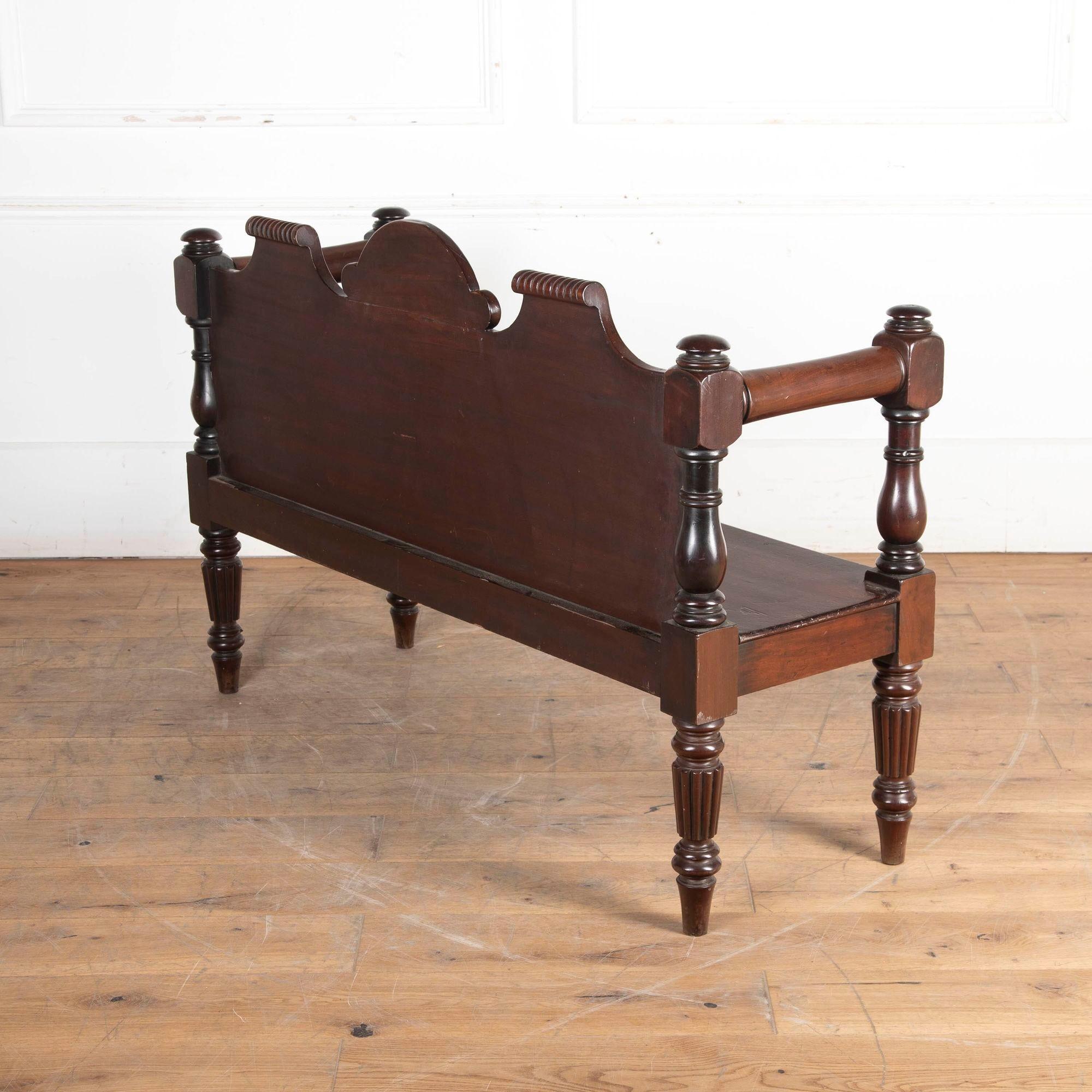 Early 19th Century Irish mahogany hall bench.
With fantastic carving on the back rest, this bench makes a great decorative bench for any hall space.