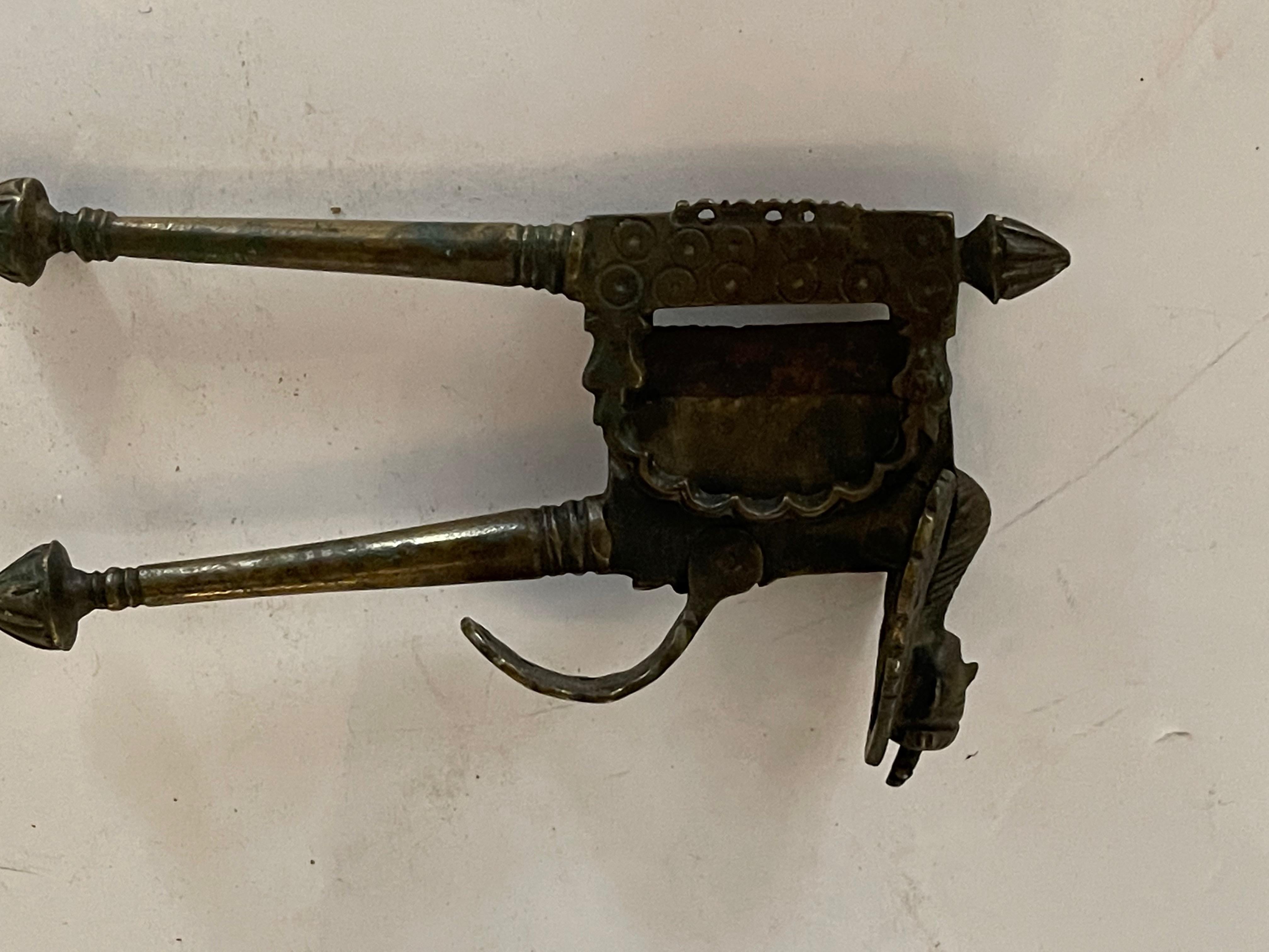 A figurative iron cutter. Made in the early 19th century. We are not sure what this was used for , but very interesting