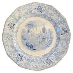 Assiette en grès à transfert bleu et blanc du début du 19e siècle