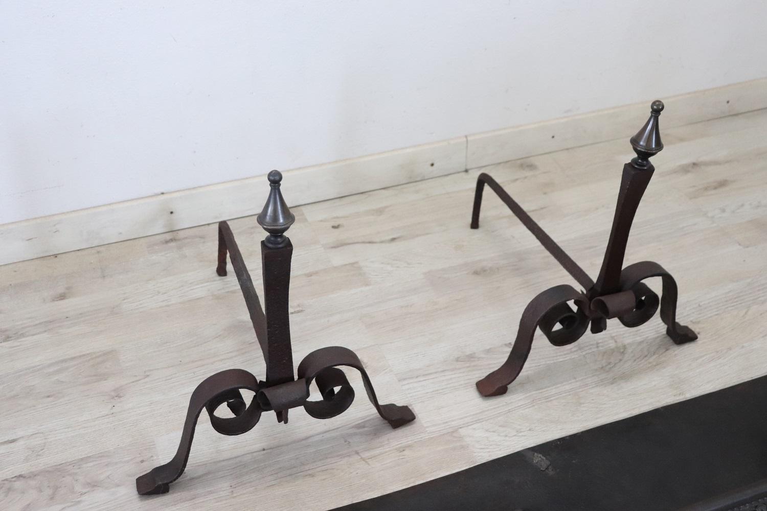 Beautiful rare Italian iron and cast iron antique fireplace tool set. This set includes:
shovel and tongs with holder,
shelter from the ash,
two andirons
beautiful hand-forged iron decoration, note the support for the shovel and tongs which