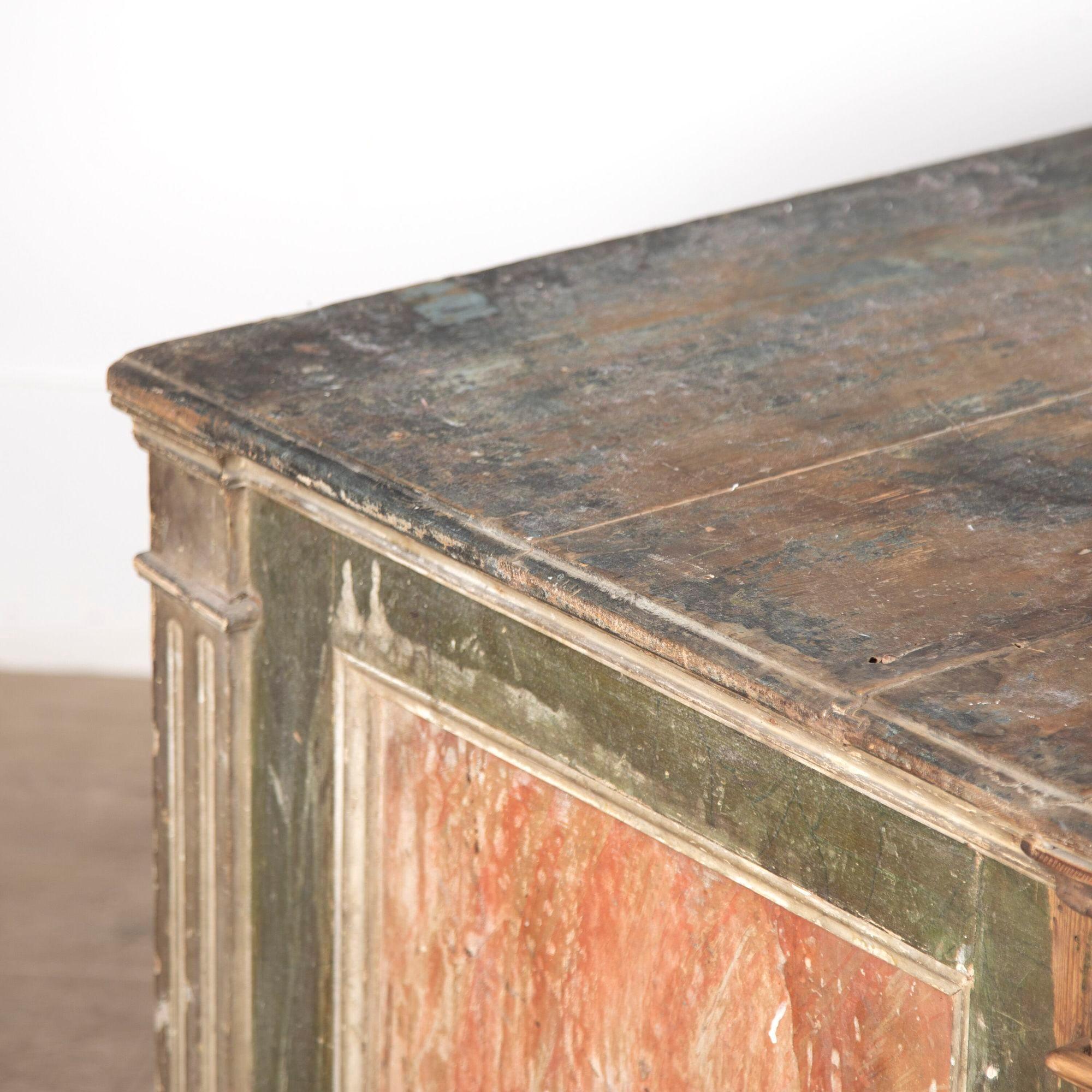 Early 19th century Italian buffet in the original, beautiful naive faux-marbled paint.