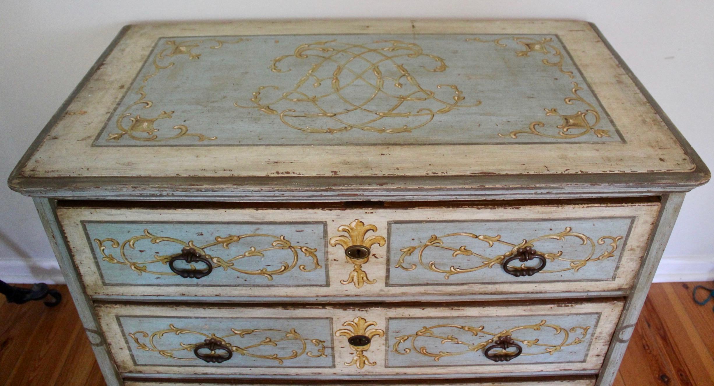 Beautiful hand painted pine 19th century Italian commode in a robins egg blue with yellow, grey and cream decoration. Drawers are joined with handcut dove tails and the piece as a whole is handmade and with wonderful joinery. Hand painted with a